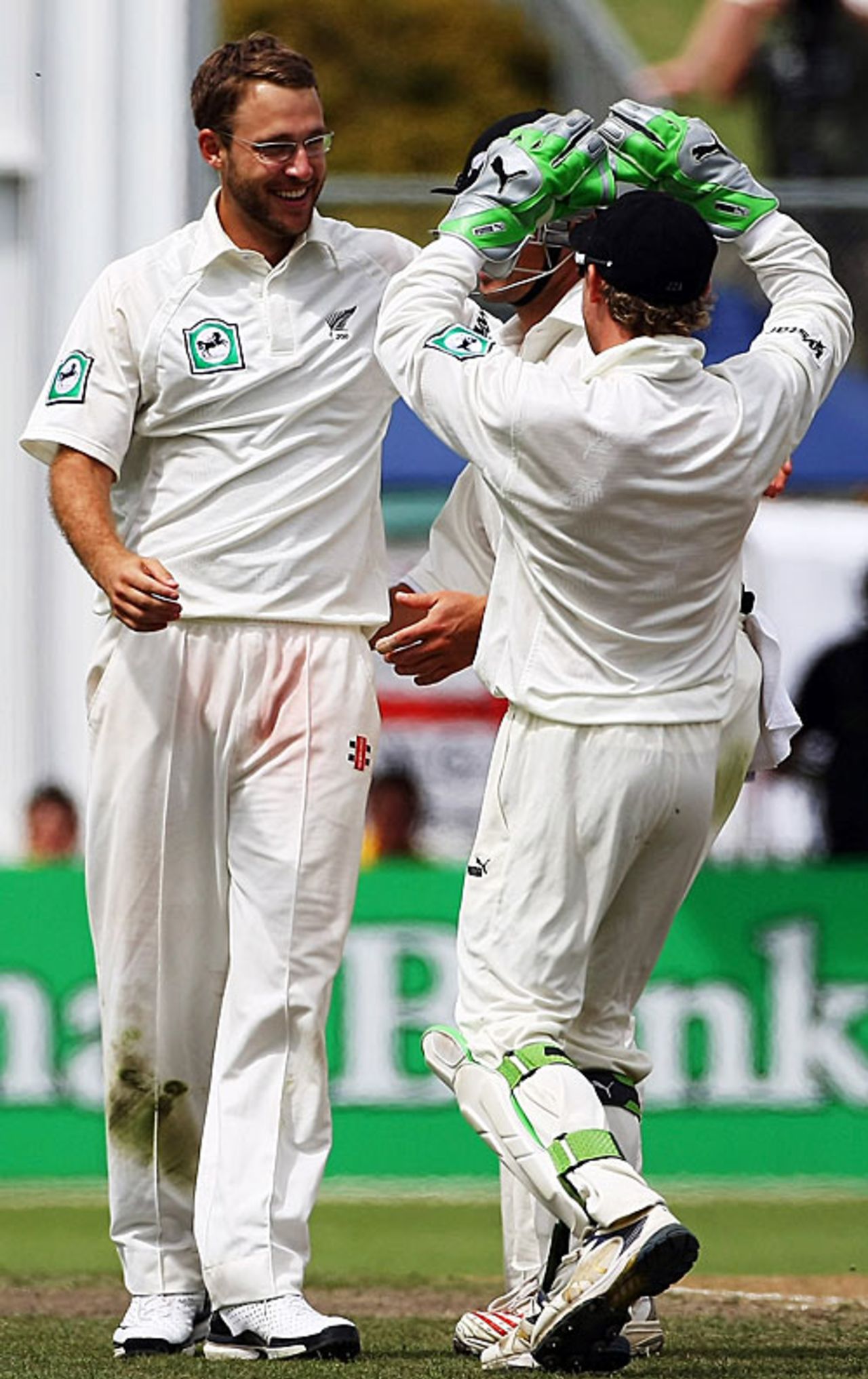 Brendon McCullum gives the high five to Daniel Vettori after bowling Andrew Strauss, New Zealand v England, 1st Test, Hamilton, March 7, 2008
