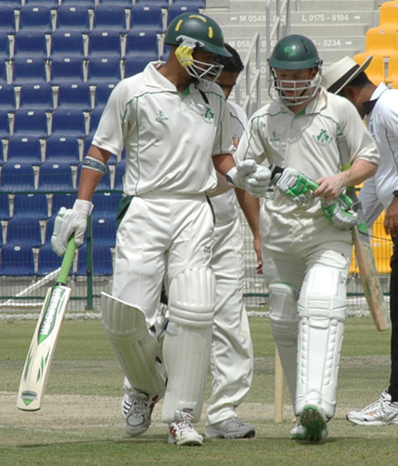 Andre Botha and Niall O'Brien head off after the end of the first session, UAE v Ireland, Intercontinental Cup, Abu Dhabi, March 7, 2008 

