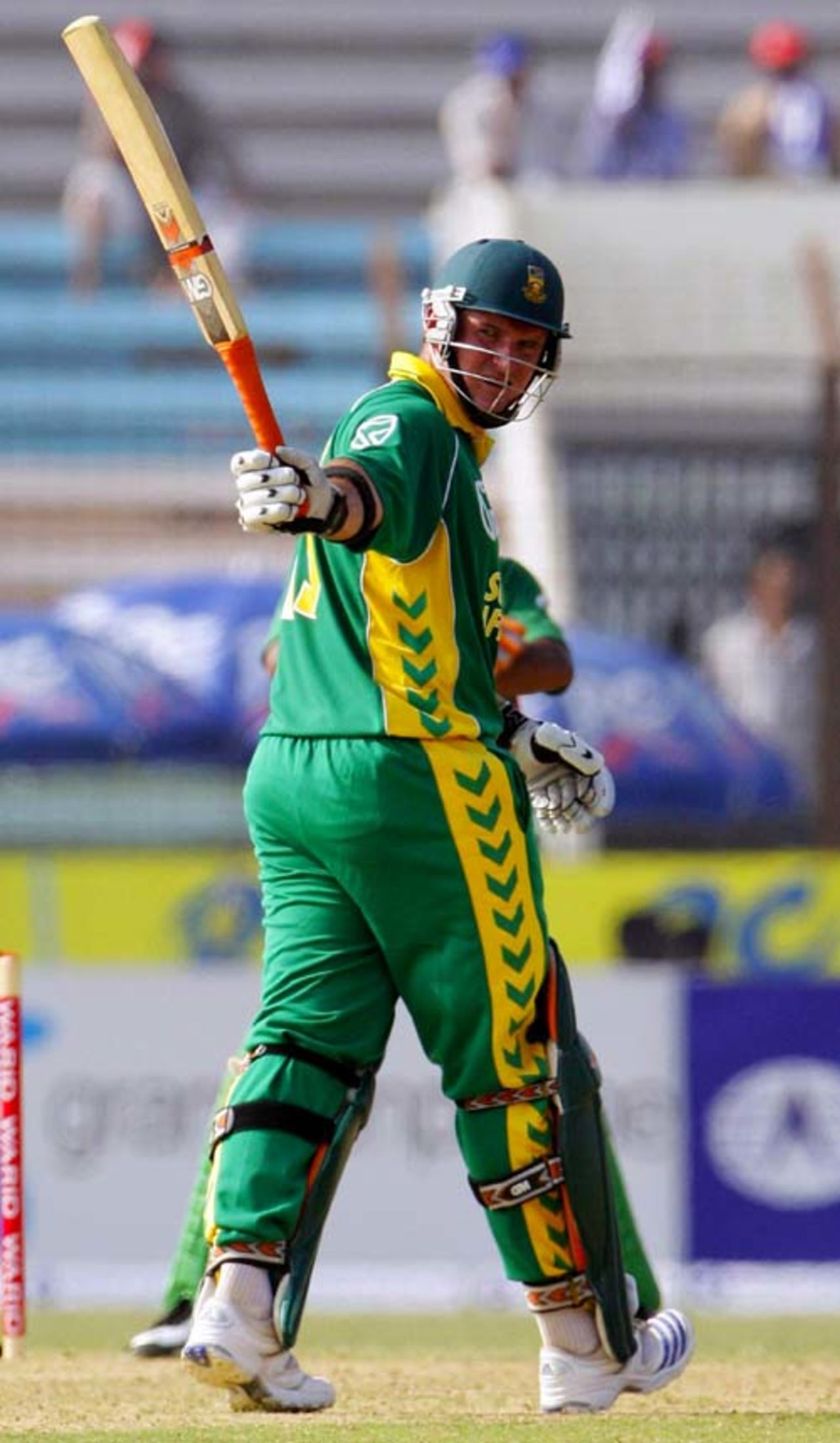Graeme Smith raises his bat on reaching 50, Bangladesh v South Africa, 1st ODI, Chittagong, March 9, 2008