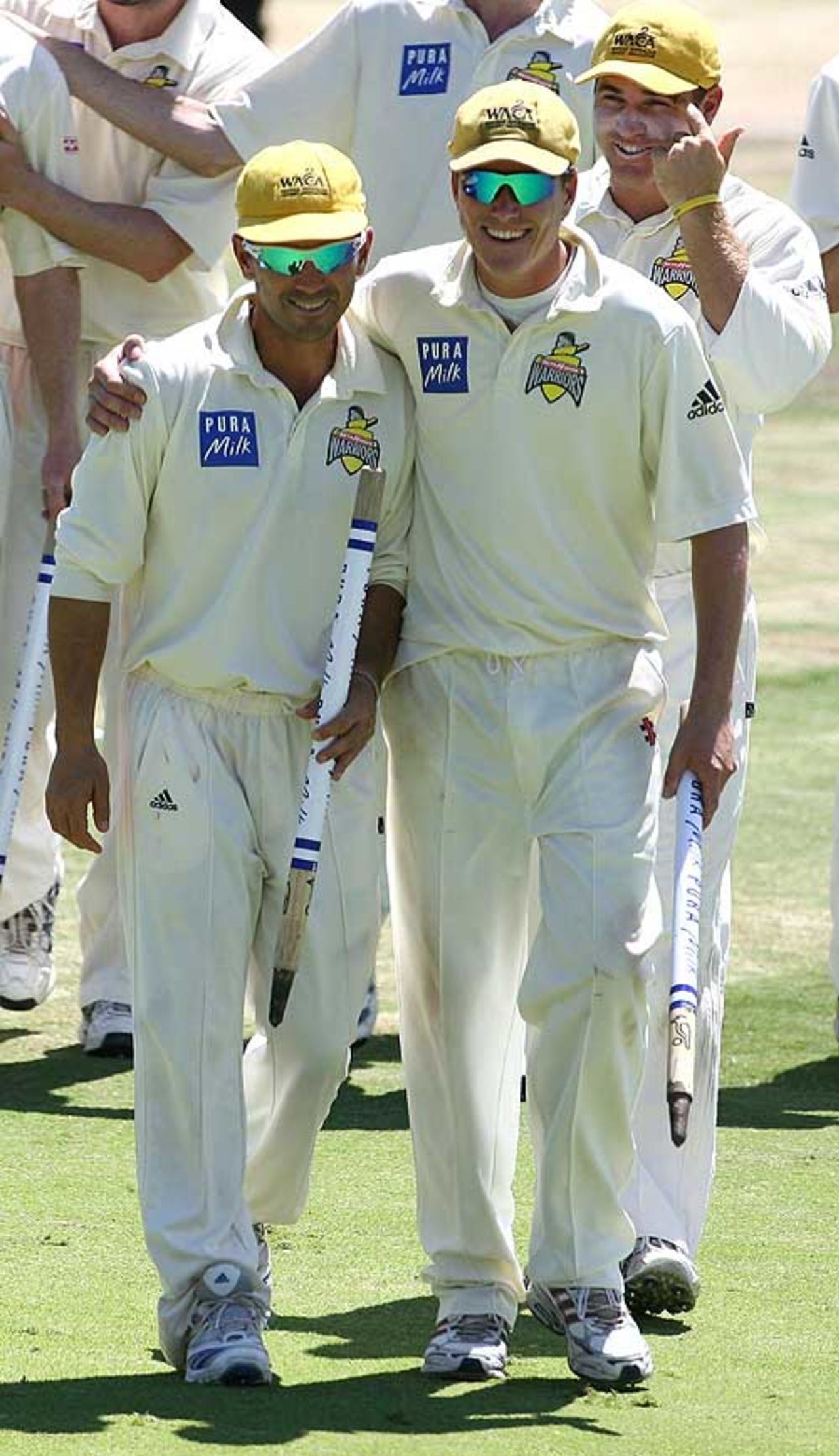 Marcus North shoulders Justin Langer off the field after his final first-class appearance for Western Australia , Western Australia v Tasmania, Pura Cup, Perth, 4th day, March 10, 2008 
