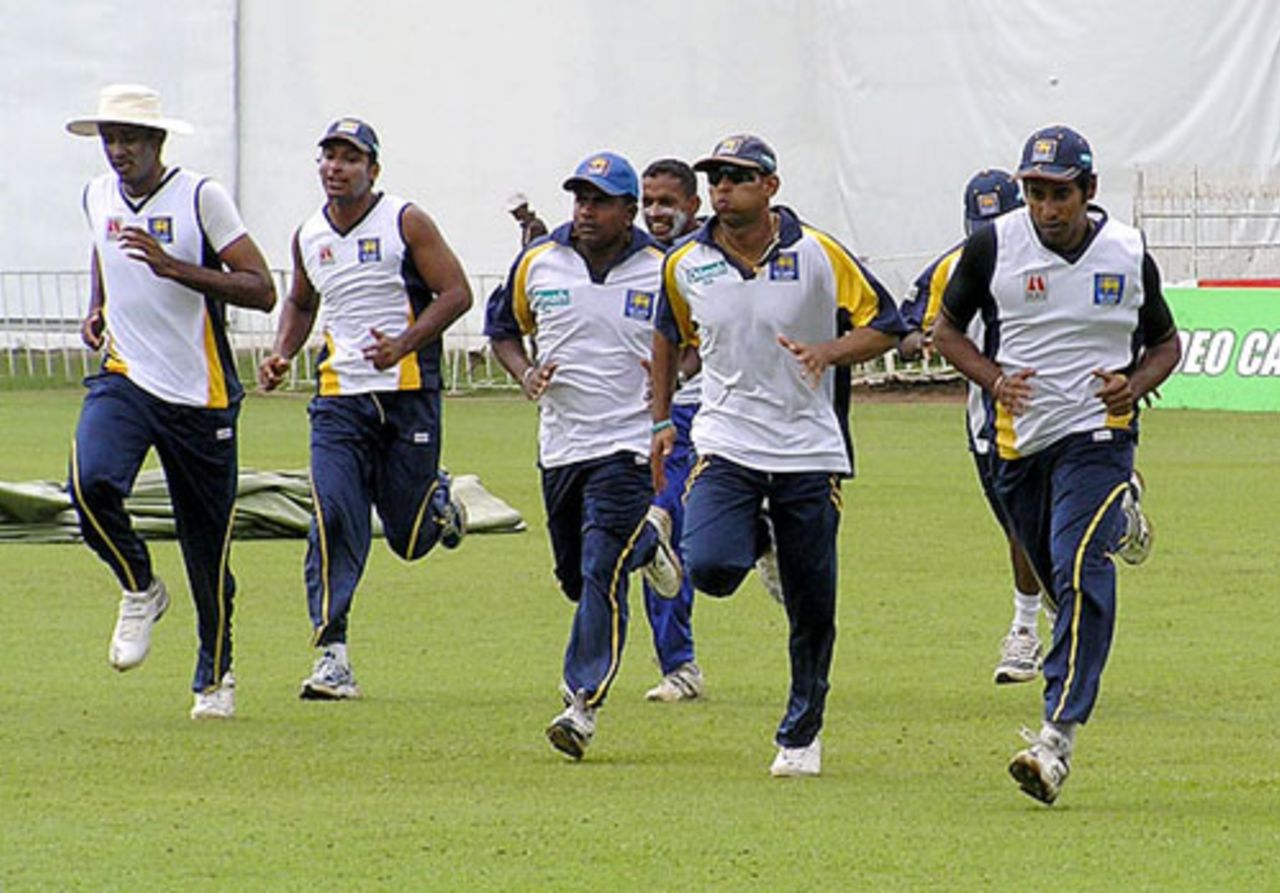 The Sri Lankan team do the rounds during a training session, Colombo, March 11, 2008