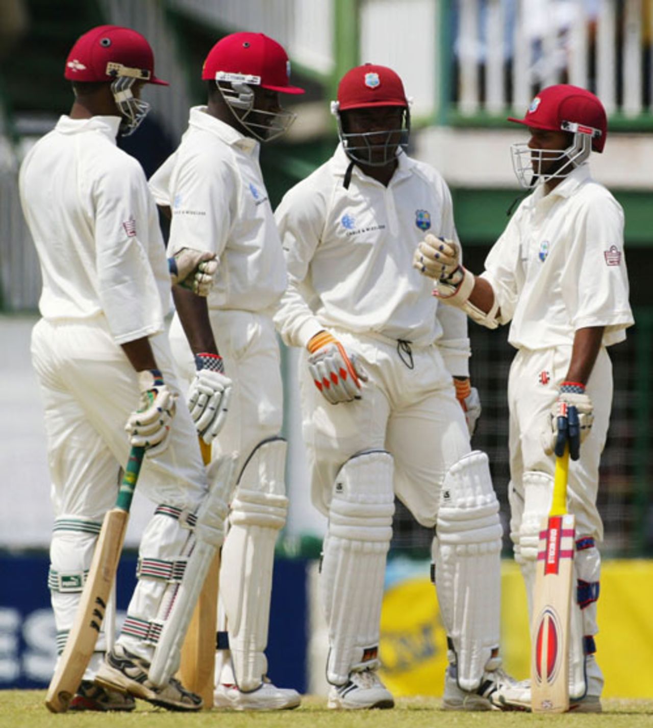 Ridley Jacobs, Wavell Hinds (Jacobs's runner), Shivnarine Chanderpaul, and Marlon Samuels (Chanderpaul's runner) have a conference, West Indies v Australia, 1st Test, Bourda Oval, Guyana, April 13, 2003