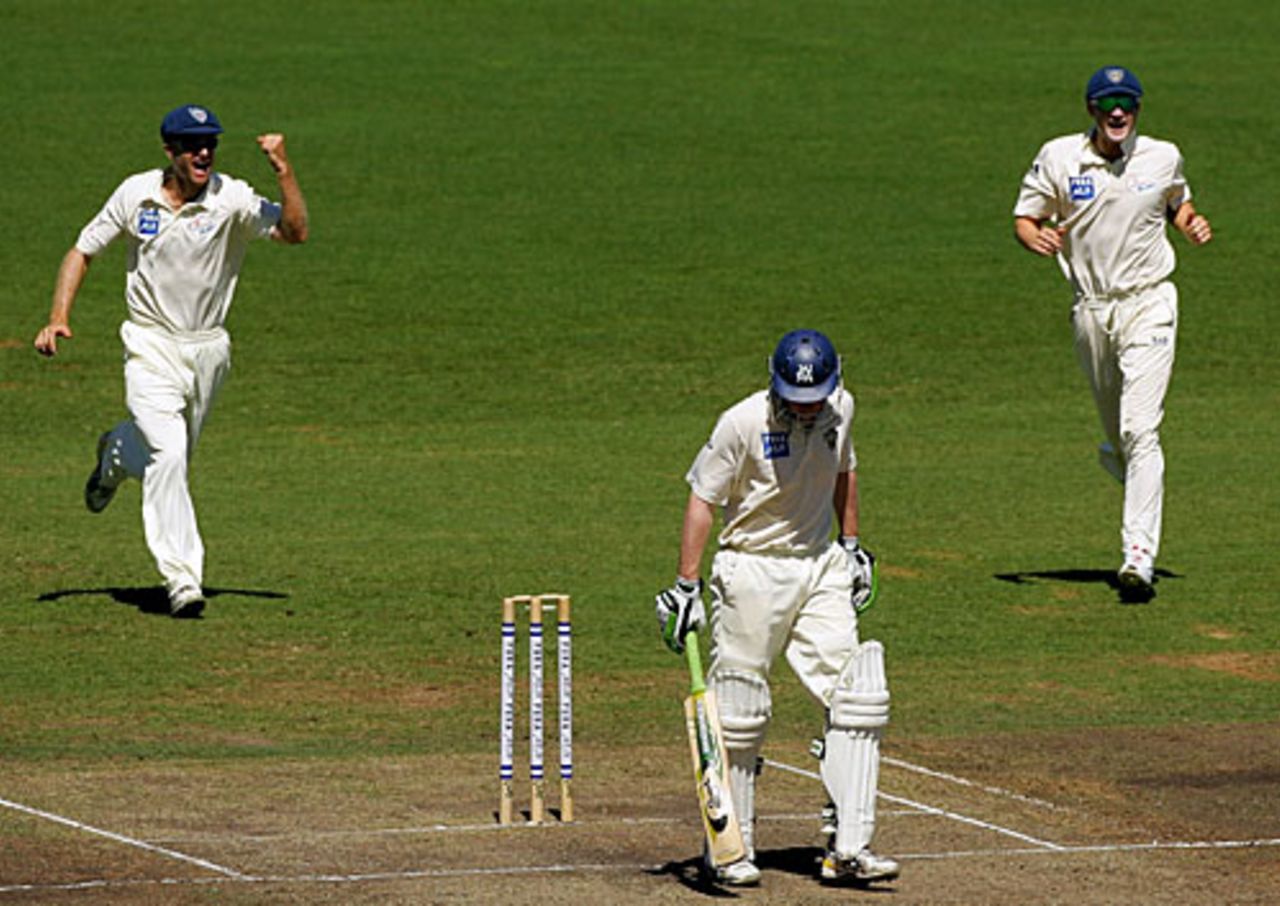 Simon Katich and Michael Clarke rush in after Lloyd Mash's wicket, New South Wales v Victoria, Pura Cup final, Sydney, 2nd day, March 16, 2008