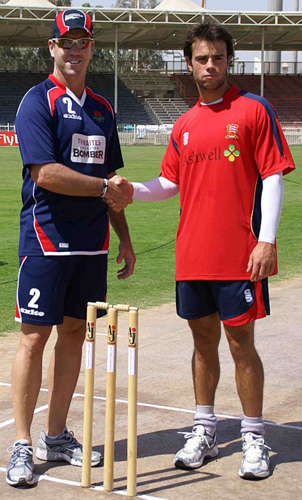 Stuart Law and Mark Pettini shake hands at the toss, Essex v Lancashire, Pro ARCH Trophy, Sharjah, March 16, 2008