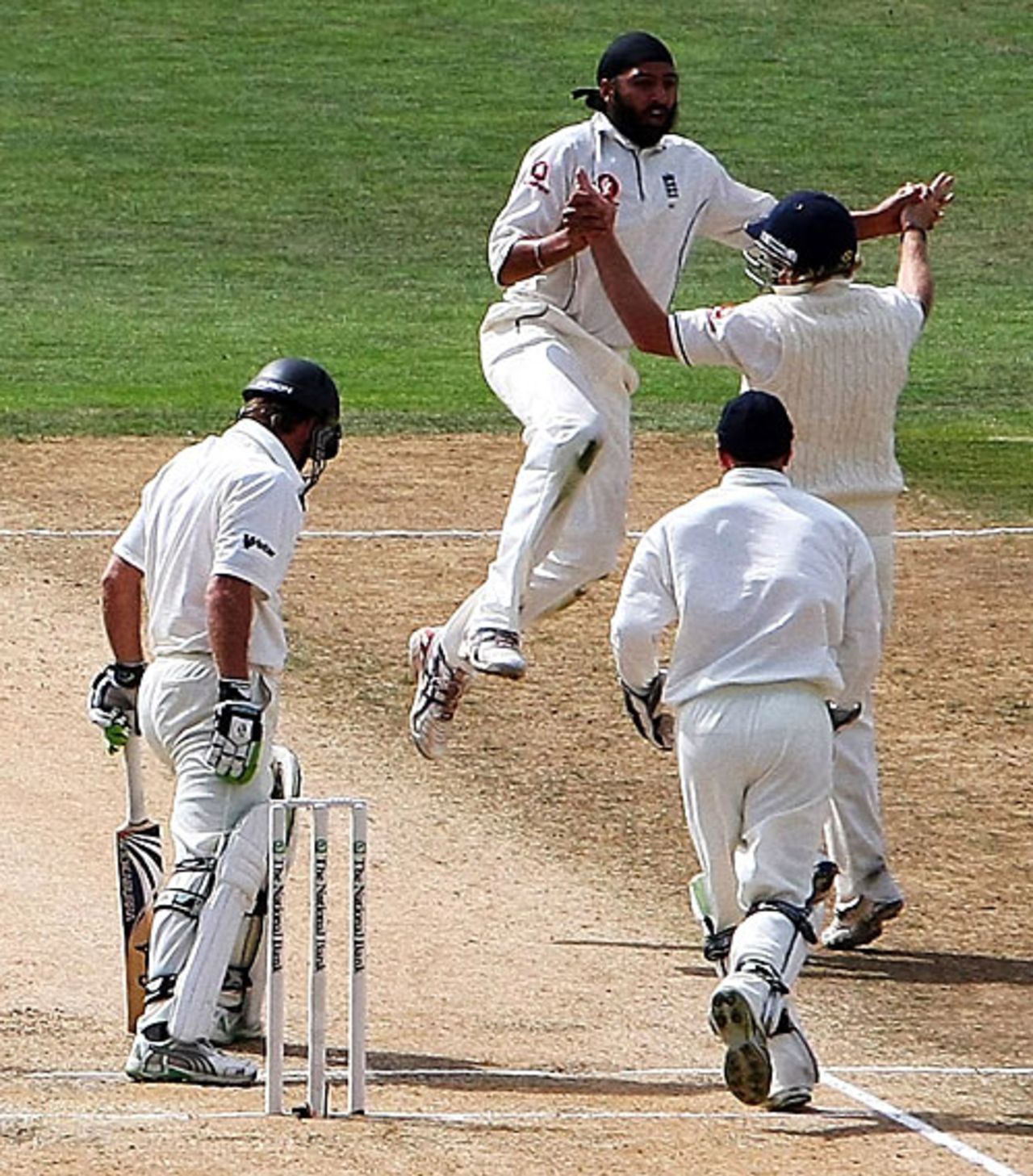 Monty Panesar skips and jumps to celebrate the breakthrough wicket of Jamie How, New Zealand v England, 3rd Test, Napier, March 25, 2008