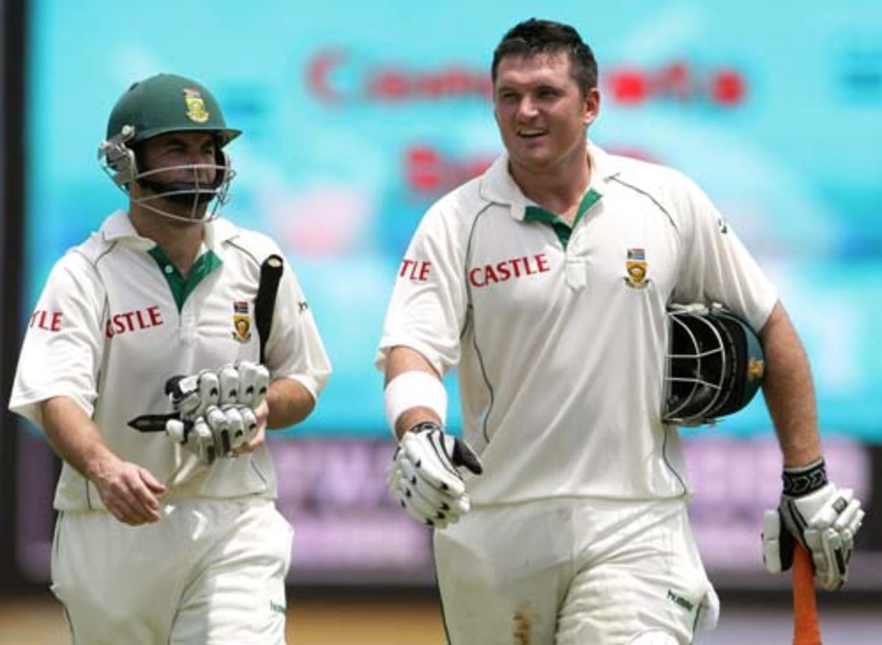Neil McKenzie and Graeme Smith return to the pavilion after their fruitful association before lunch, India v South Africa, 1st Test, Chennai, 1st day, March 26, 2008 