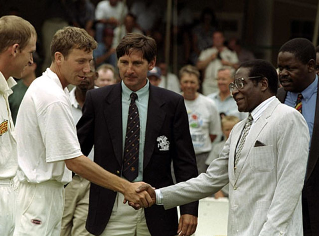 Mike Atherton greets Robert Mugabe at John Barclay looks on, Zimbabwe v England, 2nd Test, Harare, December 28, 1996