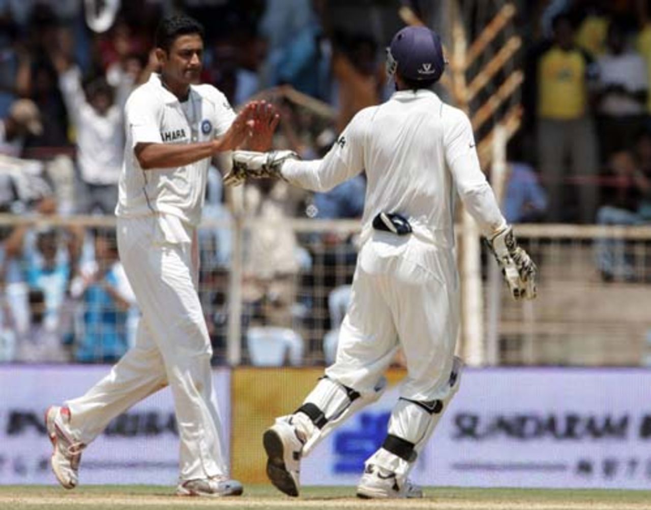 Some respite for India as Anil Kumble and Mahendra Singh Dhoni celebrate Hashim Amla's run-out, India v South Africa, 1st Test, Chennai, 2nd day, March 27, 2008 