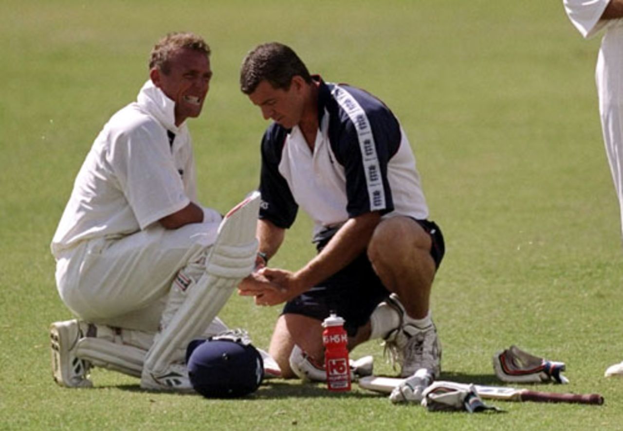Alec Stewart receives treatment shortly before the abandonment of the Sabina Park Test, West Indies v England, 1st Test, Jamaica, January 29, 1998