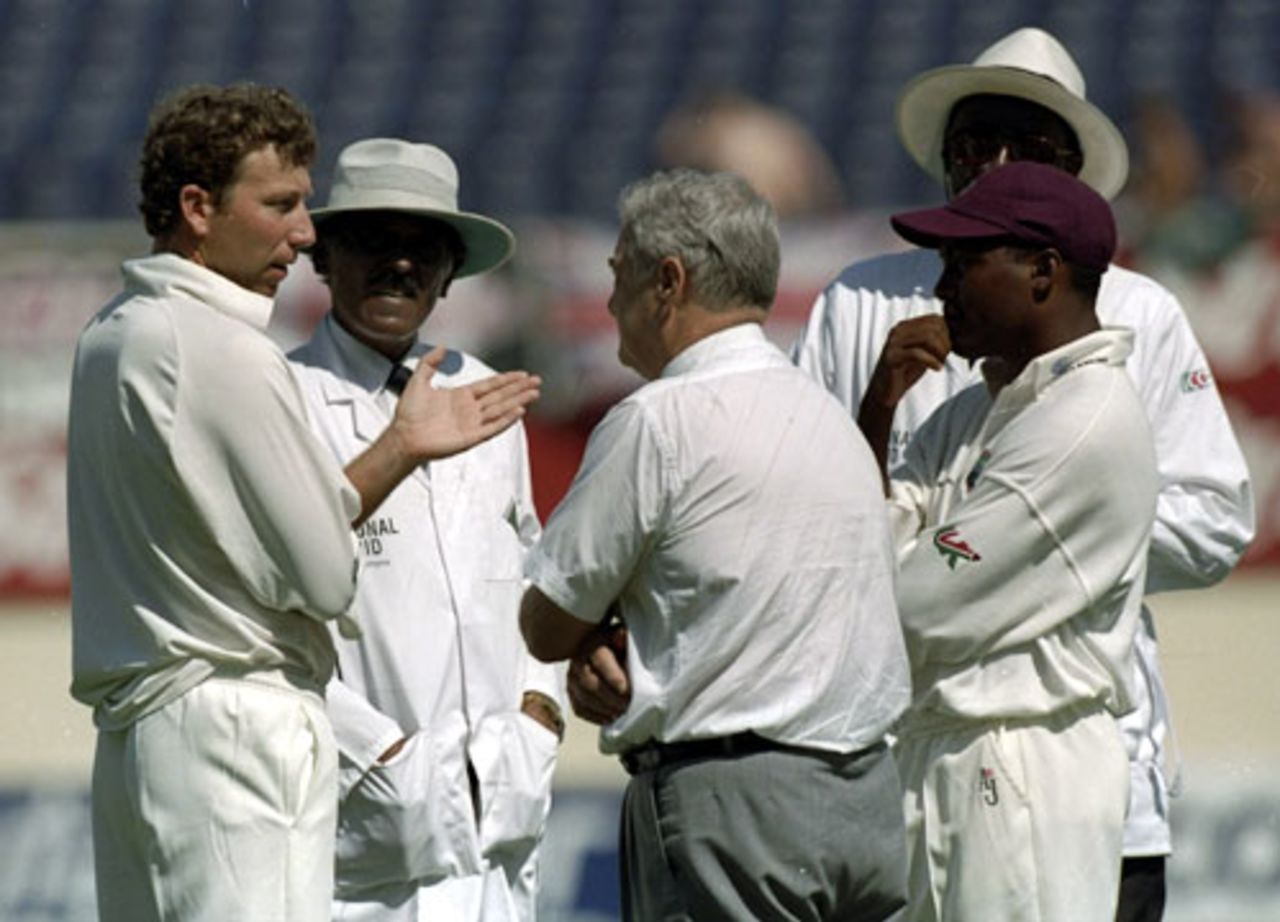 Mike Atherton and Brian Lara discuss the Sabina Park pitch with the match officials shortly before the abandonment of theTest, West Indies v England, 1st Test, Jamaica, January 29, 1998