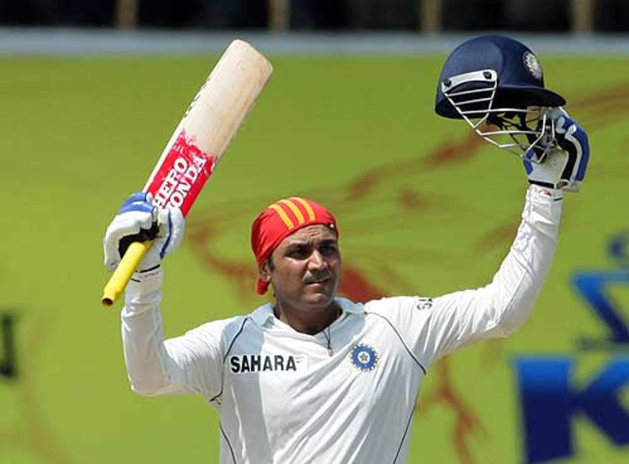 Virender Sehwag celebrates another landmark during an epic triple, India v South Africa, 1st Test, Chennai, 3rd day, March 28, 2008