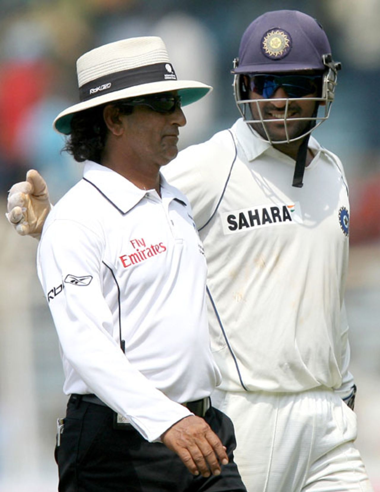 Asad Rauf gets a pat on the back from Mahendra Singh Dhoni, India v South Africa, 1st Test, Chennai, 5th day, March 30, 2008 