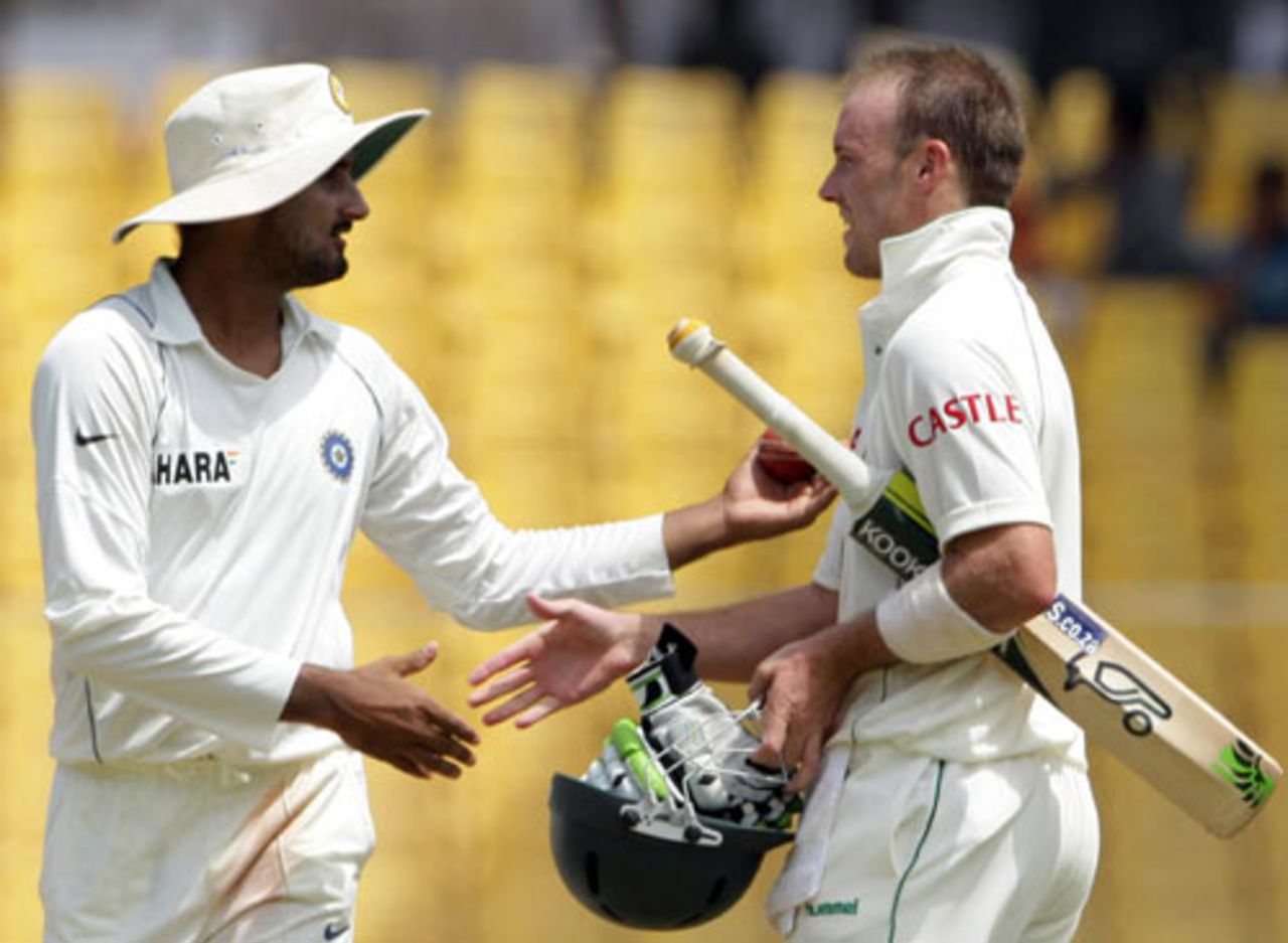 Harbhajan Singh congratulates AB de Villiers on reaching his century, India v South Africa, 2nd Test, Ahmedabad, 2nd day, April 4, 2008
