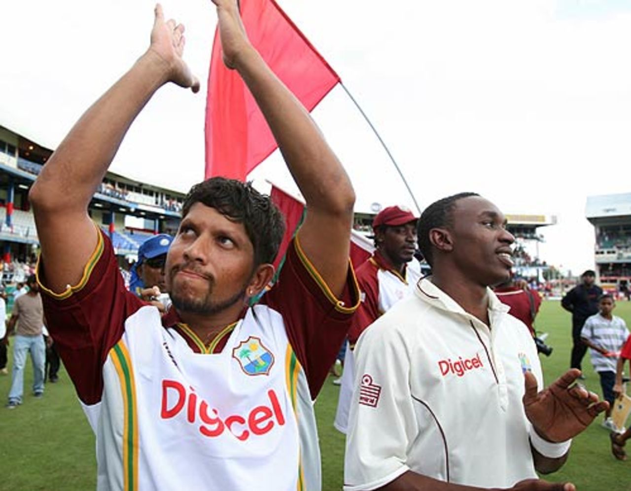 Ramnaresh Sarwan and Dwayne Bravo acknowledge the crowd's applause after the victory,  West Indies v Sri Lanka, 2nd Test, Trinidad, 4th day, April 6, 2008 