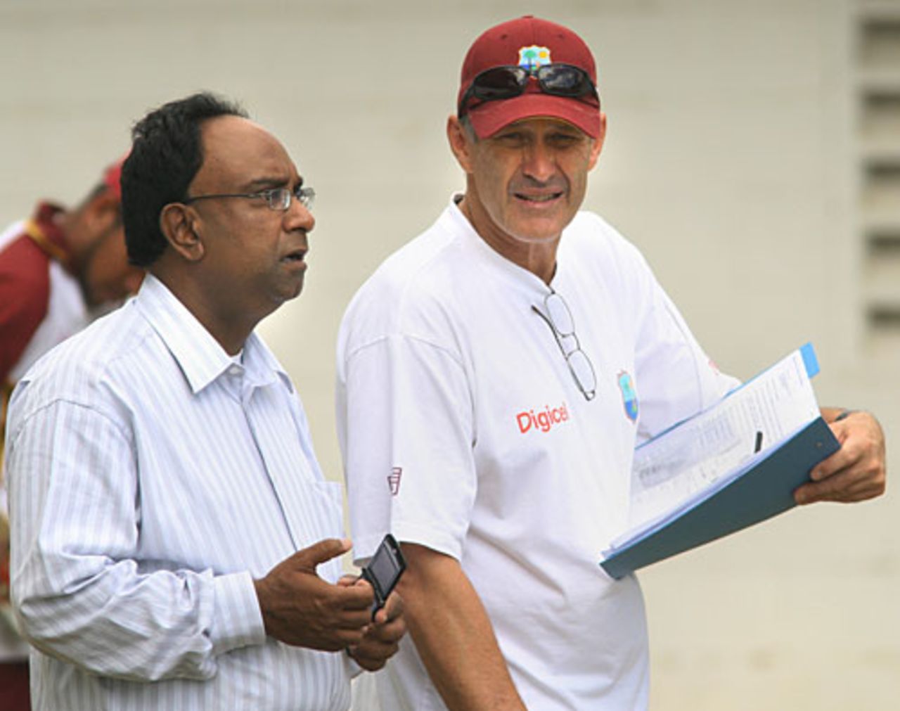 West Indies manager Omar Khan and coach John Dyson watch a practice session, Queen's Park Oval, Trinidad, April 9, 2008