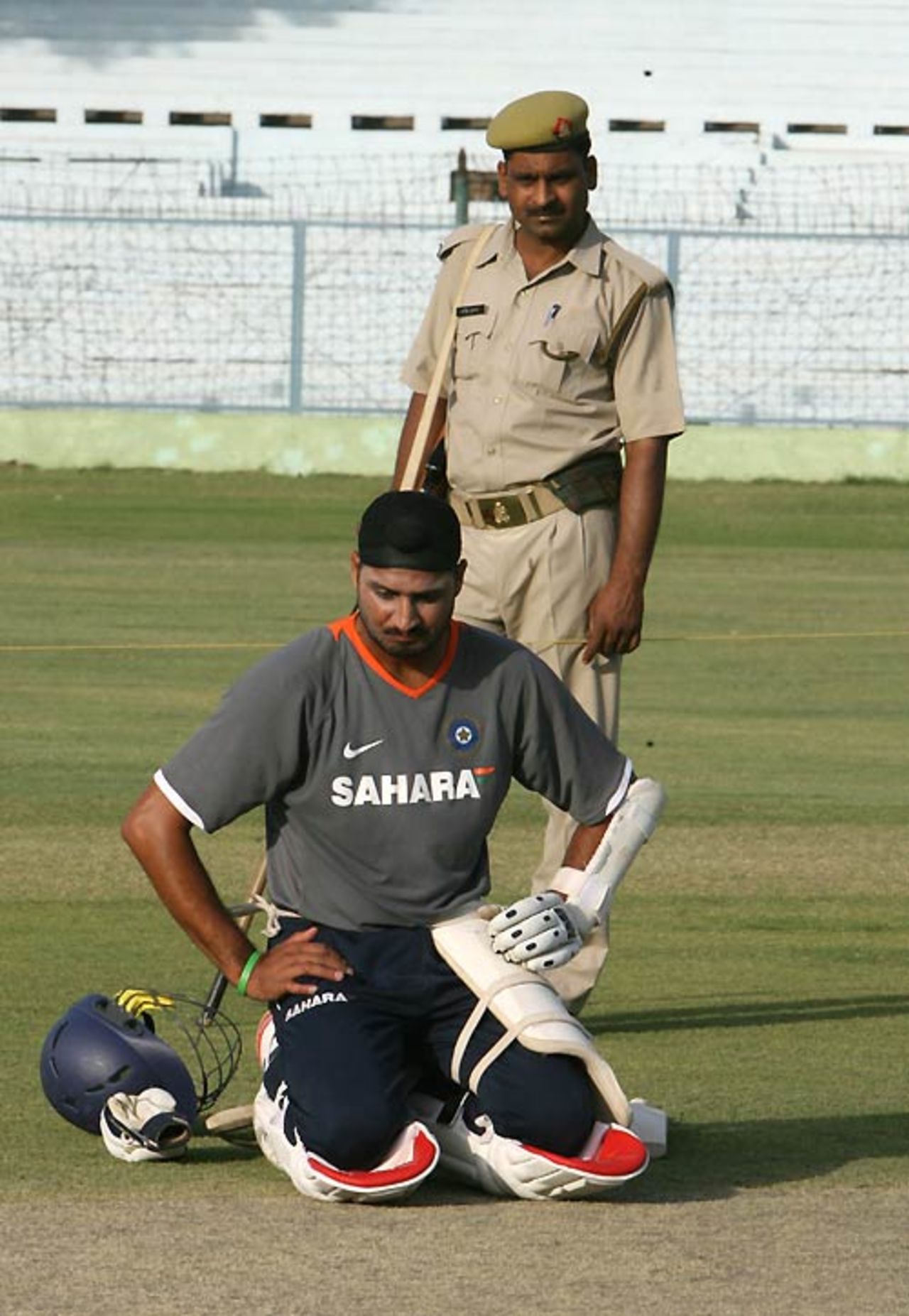Harbhajan Singh studies the Green Park pitch intensely, Kanpur, April 9, 2008