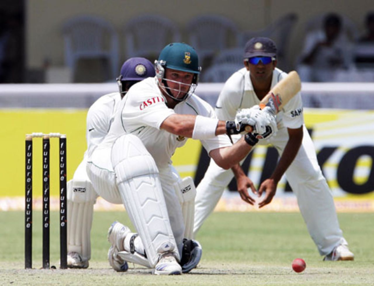 Graeme Smith prepares to sweep the ball during his 69, India v South Africa, 3rd Test, Kanpur, 1st day, April 11, 2008