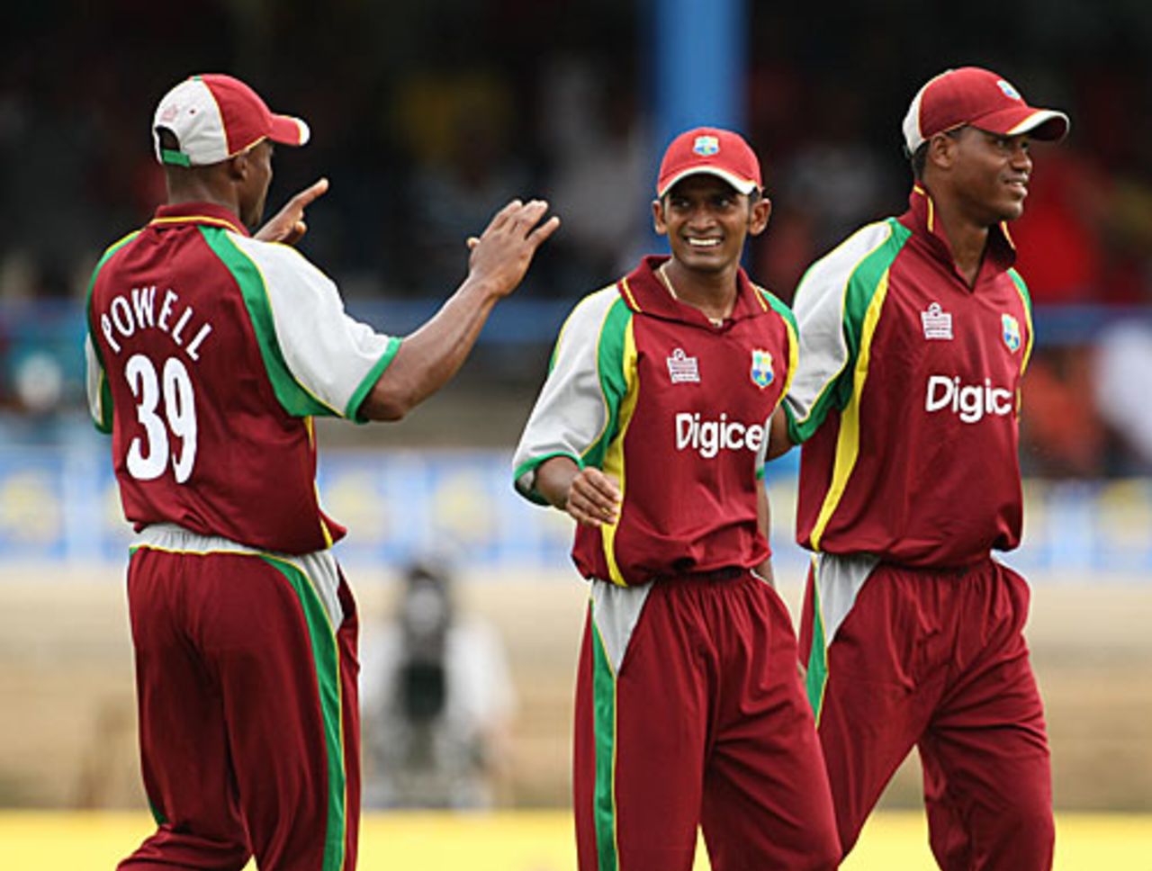Daren Powell congratulates Sewnarine Chattergoon on his sharp catch at point, West Indies v Sri Lanka, 2nd ODI, Trinidad, April 12, 2008