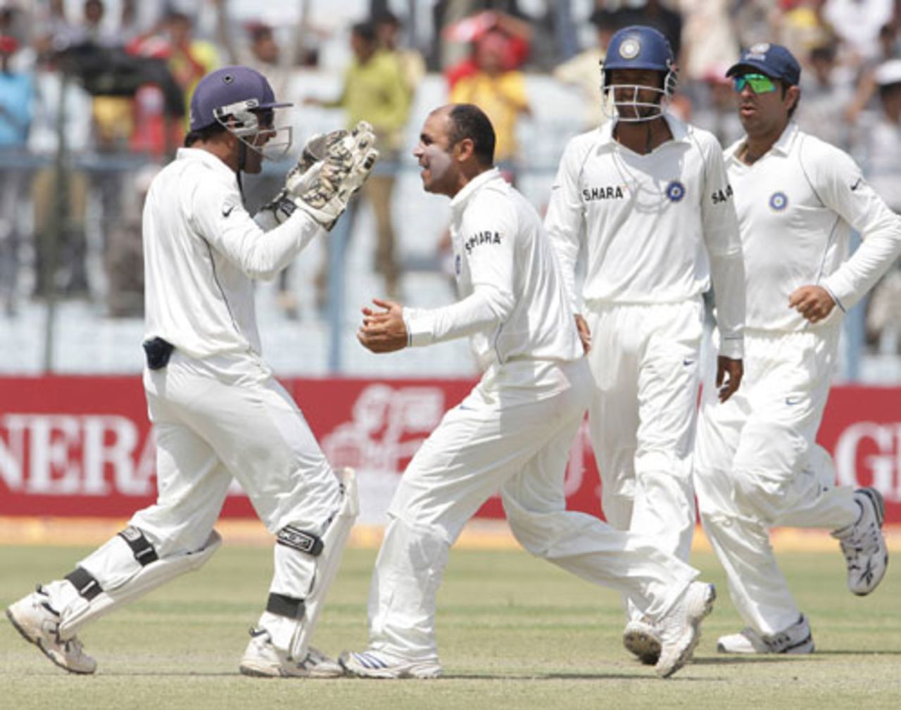 Virender Sehwag celebrates with Mahendra Singh Dhoni after dismissing Jacques Kallis with his first ball, India v South Africa, 3rd Test, Kanpur, 3rd day, April 13, 2008