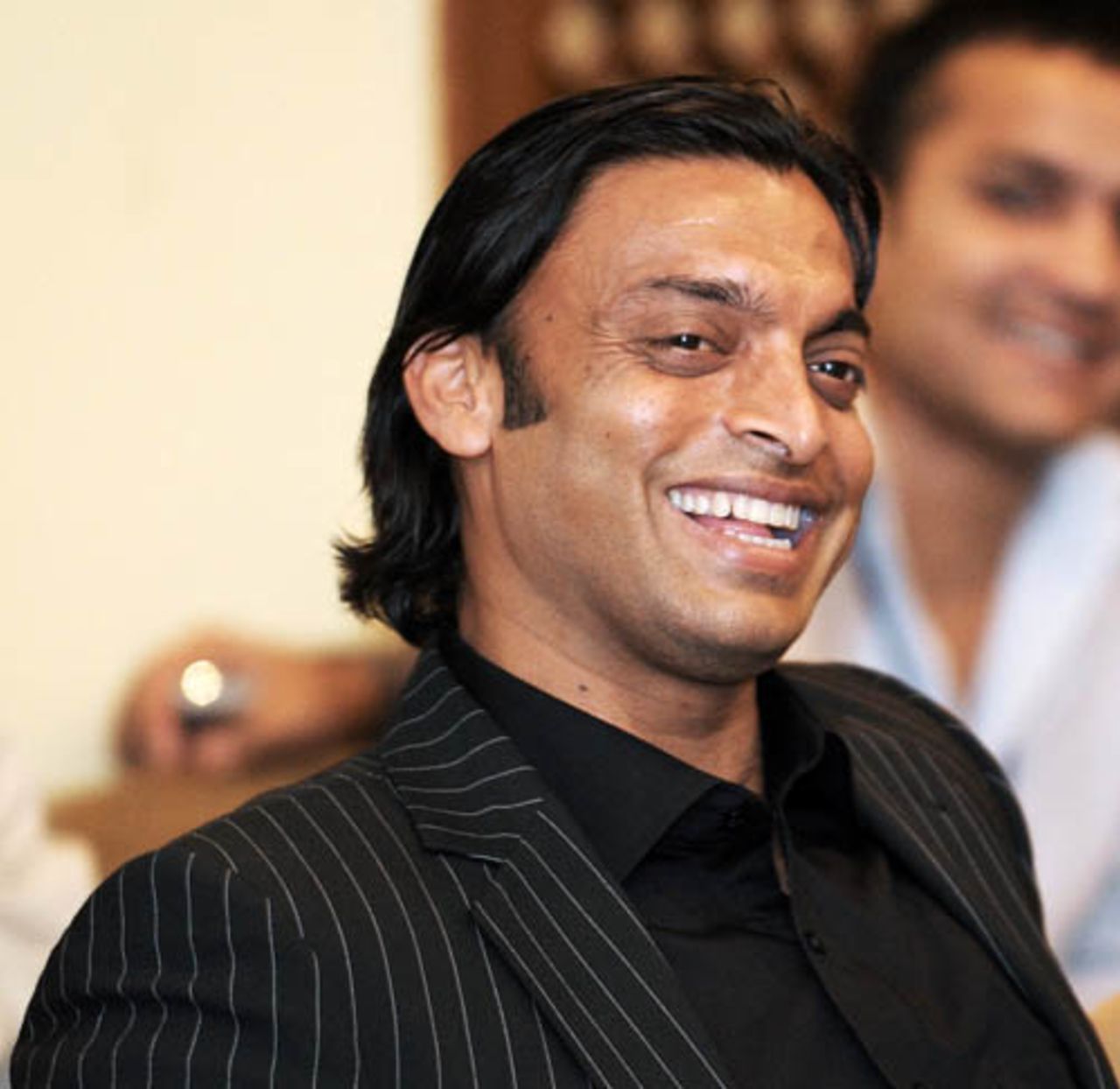 Shoaib Akhtar laughs as PCB chairman Nasim Ashraf responds to a question during a sitting of the Pakistan senate committee on sports, Islamabad, April 14, 2008