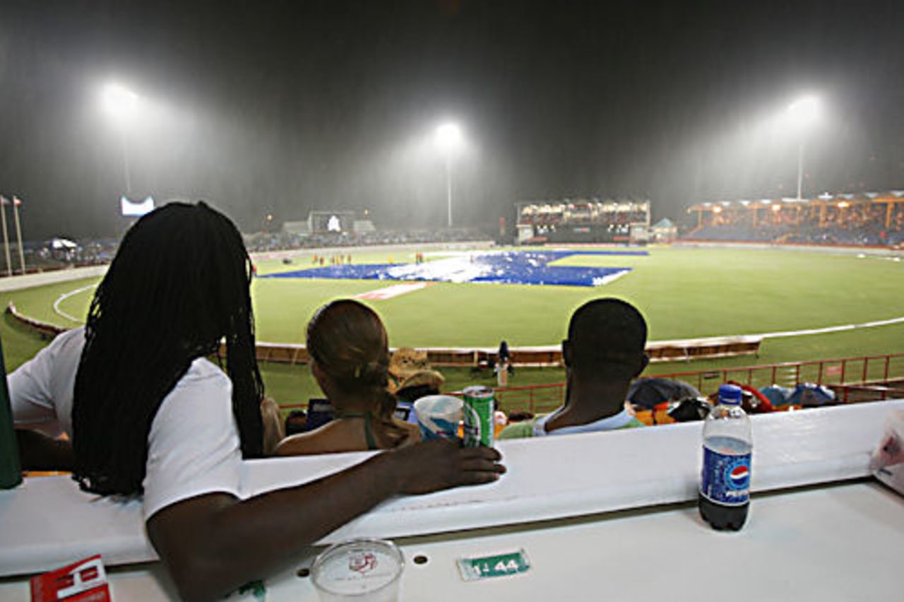 Spectators wait as rain interrupts play, West Indies v Sri Lanka, 3rd ODI, St Lucia, April 15, 2008