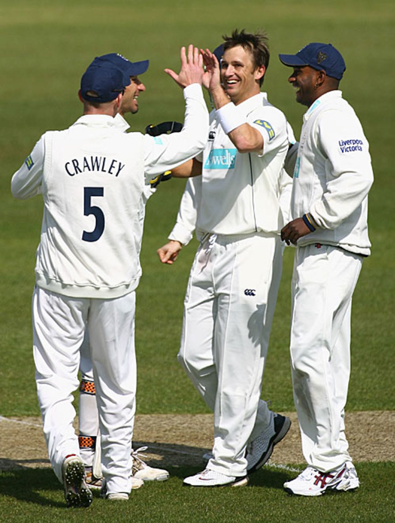 Shane Bond is congratulated on his maiden wicket for Hampshire, Hampshire v Sussex, Southampton, April 16, 2008