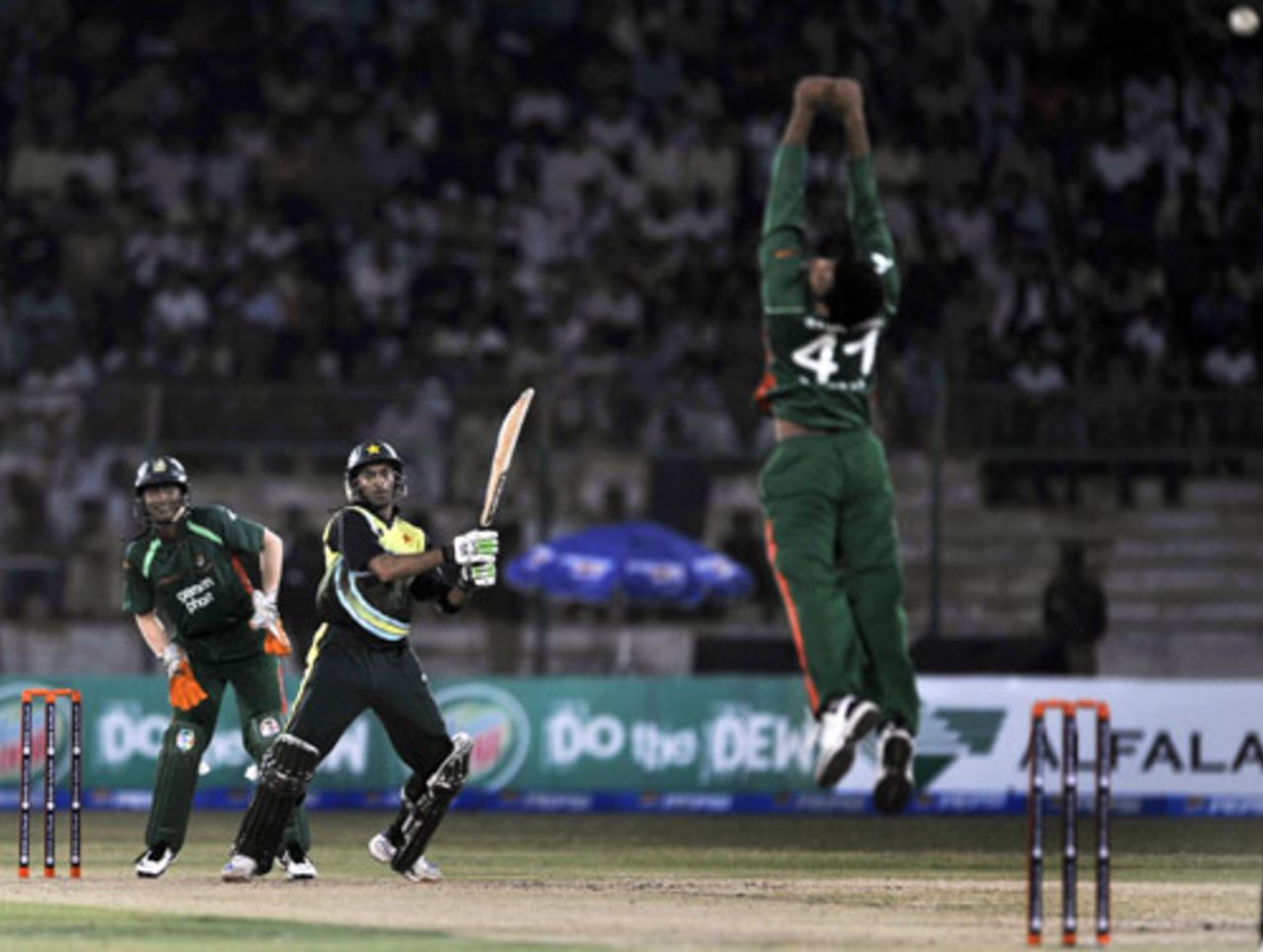 Shoaib Malik clobbers it back over the bowler's head, Pakistan v Bangladesh, Only Twenty20, Karachi, April 20, 2008 
