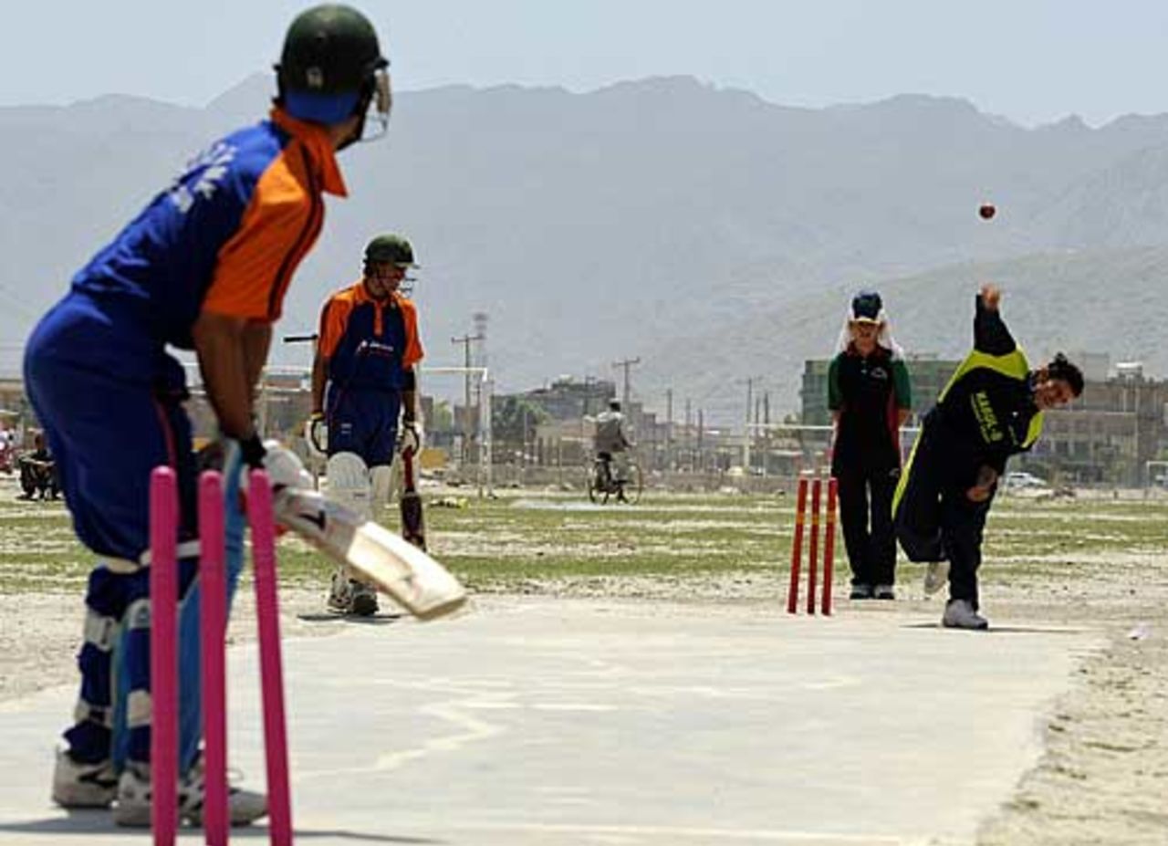 Afghan cricketers take part in a game in front of The Kabul Stadium, Afghanistan will take part in the ICC World Cricket League Division 5 later this month, Kabul, May 1, 2008