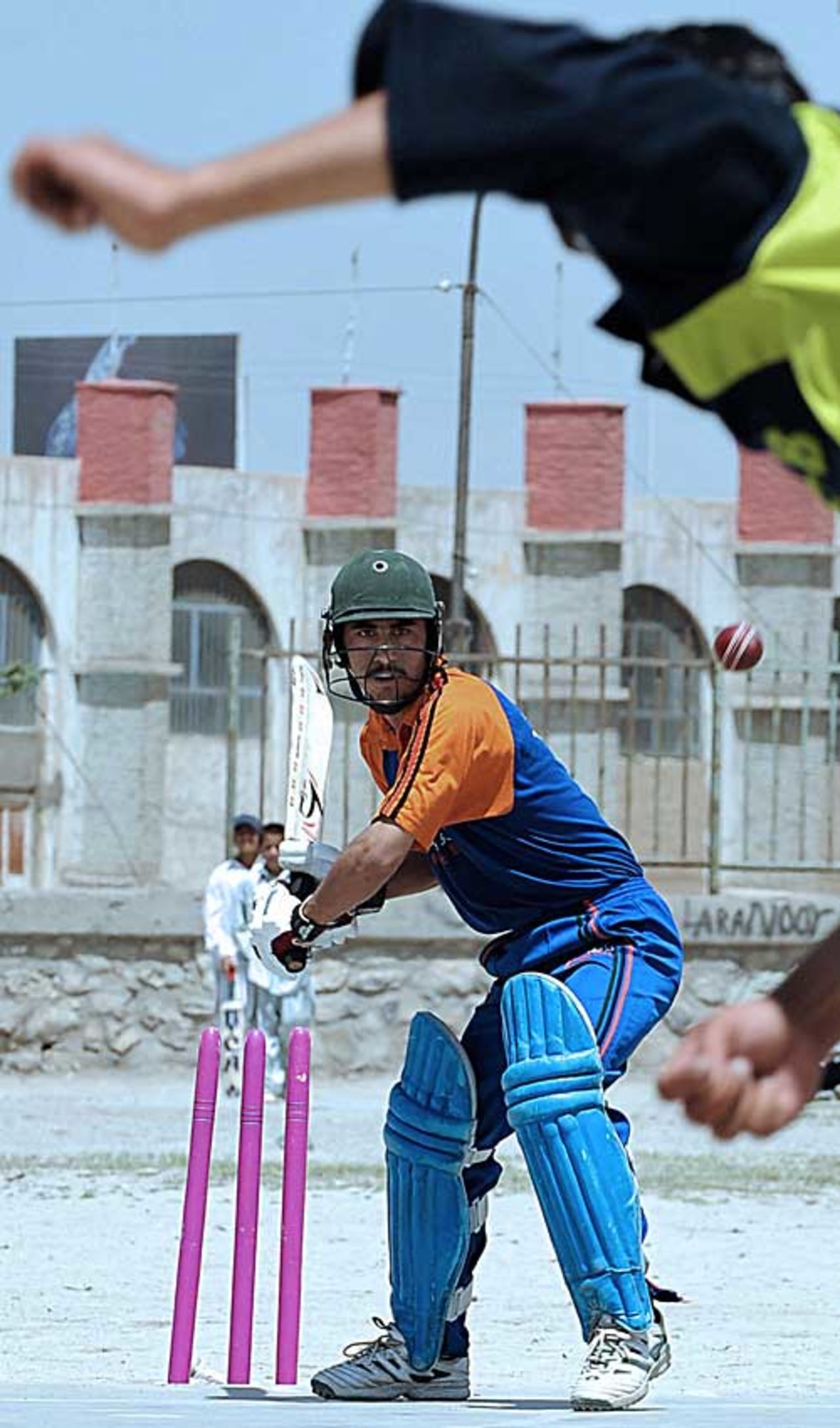 Afghan cricketers take part in a game in front of the Kabul Stadium. Cricket is popular among Afghans who have lived in Pakistan and recently returned to their country after decades of war. The national team will play eleven others in the ICC  World Cricket League Division 5 in late May, Kabul, May 1, 2008