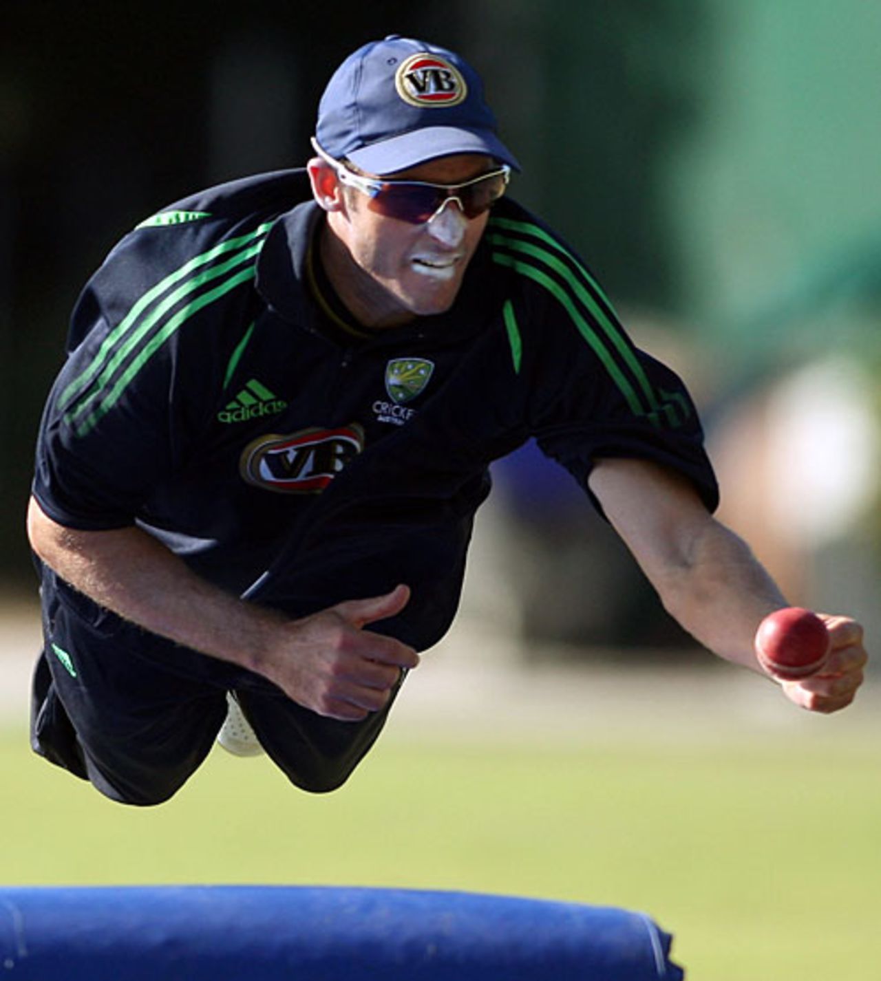 Michael Hussey dives to catch the ball, Allan Border Field, Brisbane, May 5, 2008