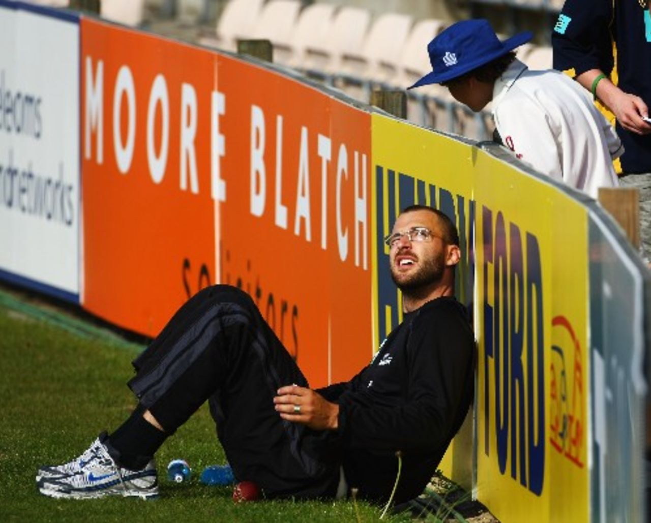 Daniel Vettori sits by the boundary fence as he watches his team-mates play, England Lions v New Zealanders, The Rose Bowl, May 10, 2008