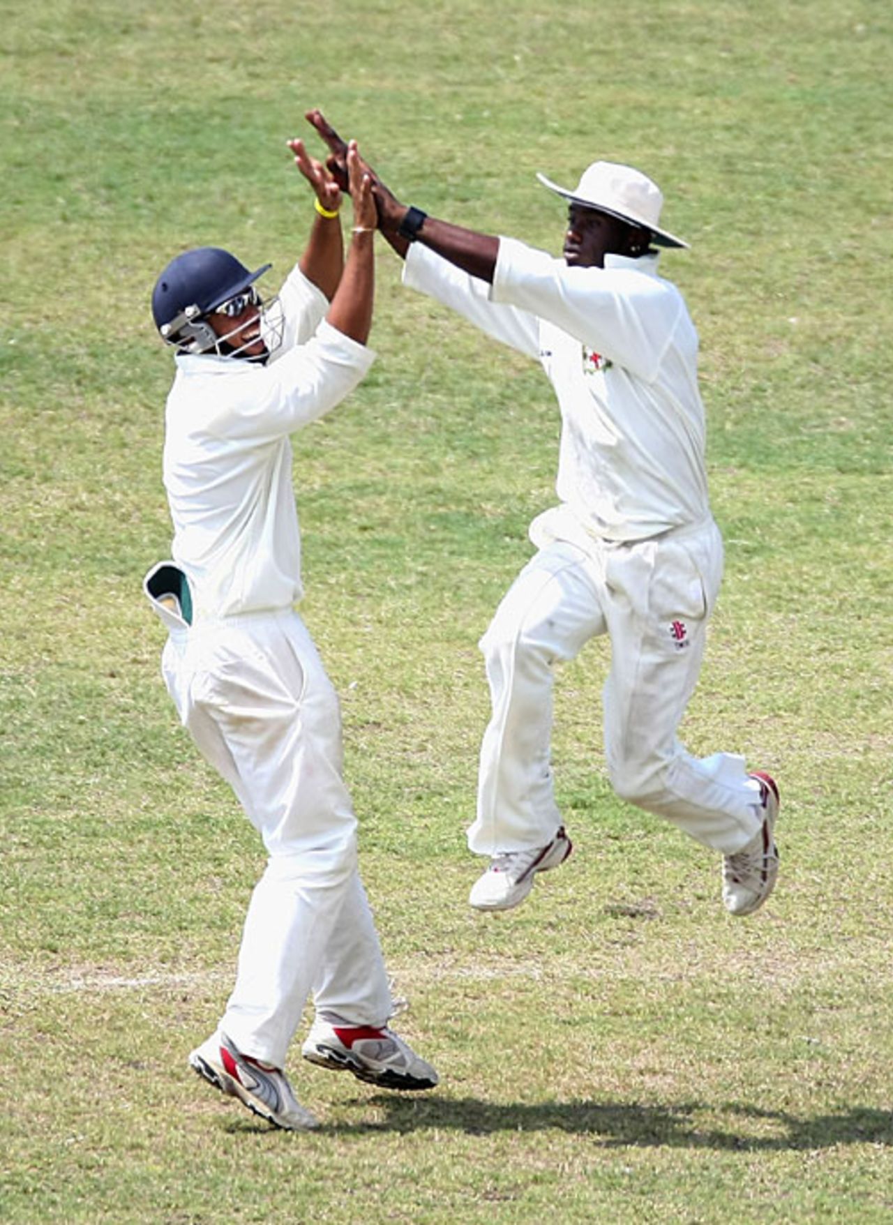 Simon Jackson and Xavier Marshall celebrate the fall of Simon Katich, Jamaica XI v Australians, Trelawny Stadium, 2nd day, May 17, 2008