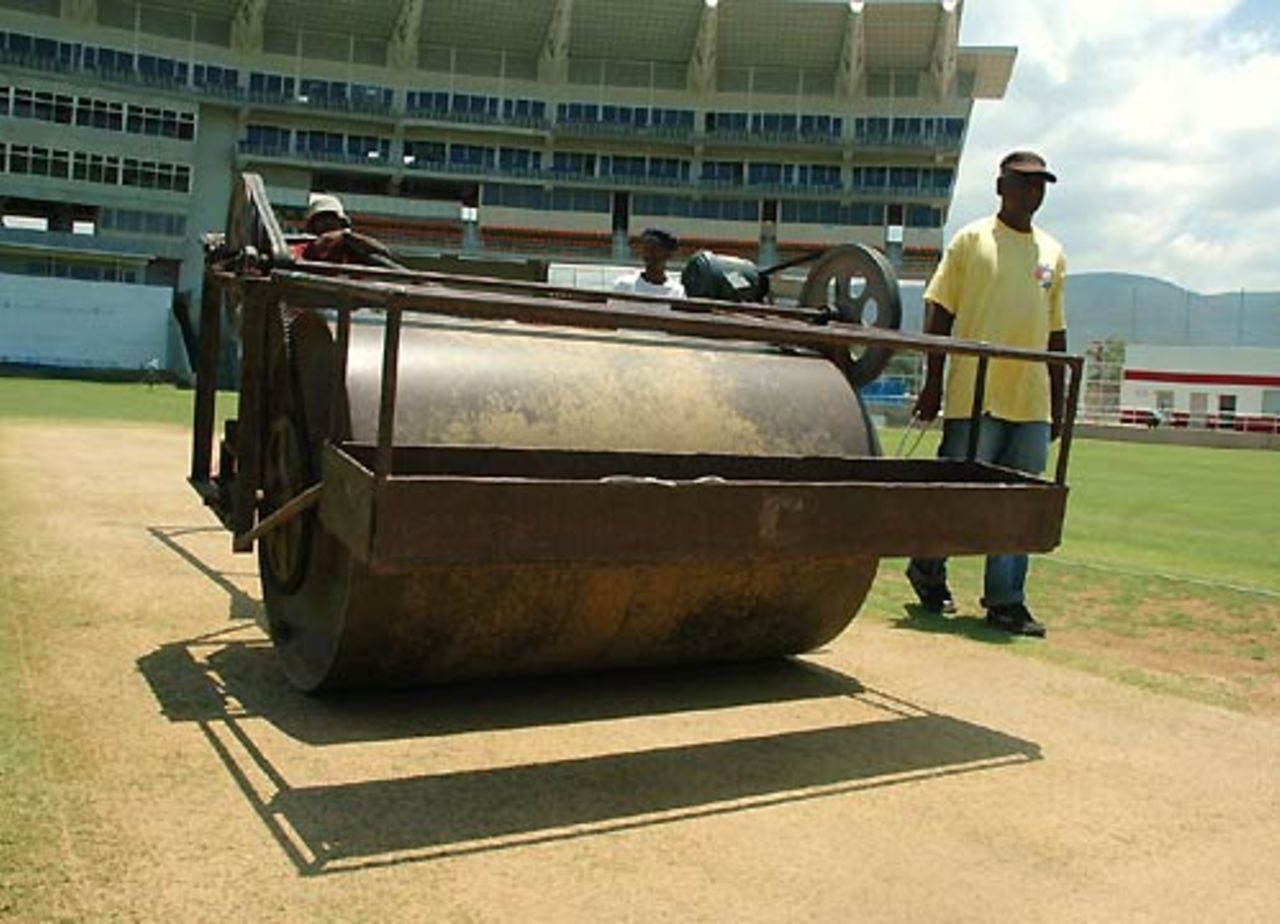 Groundsmen roll the Sabina Park pitch ahead of the first Test, Kingston, May 19, 2008
