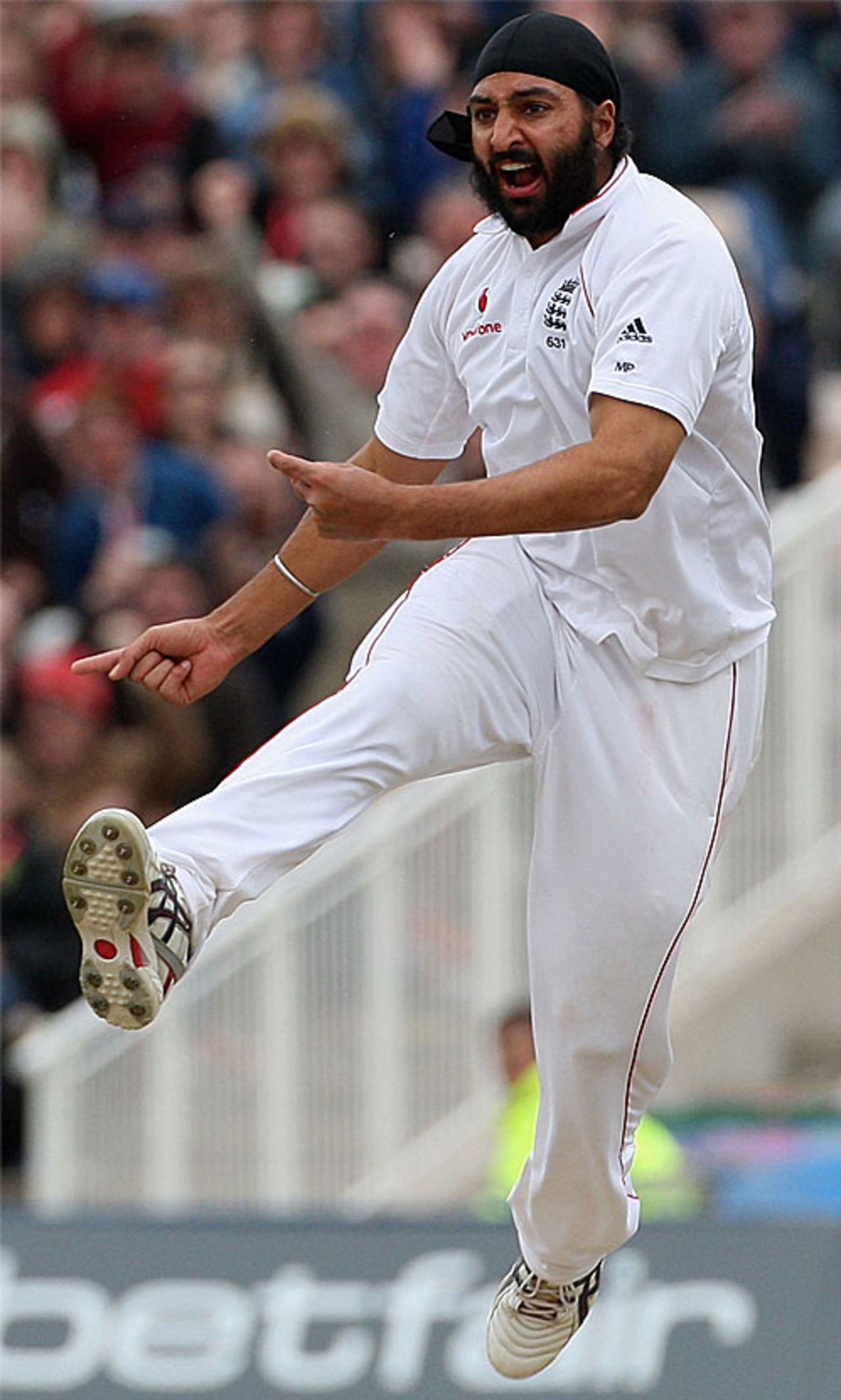 An airborne Monty Panesar celebrates removing Jamie How, England v New Zealand, 2nd Test, Old Trafford, May 25, 2008