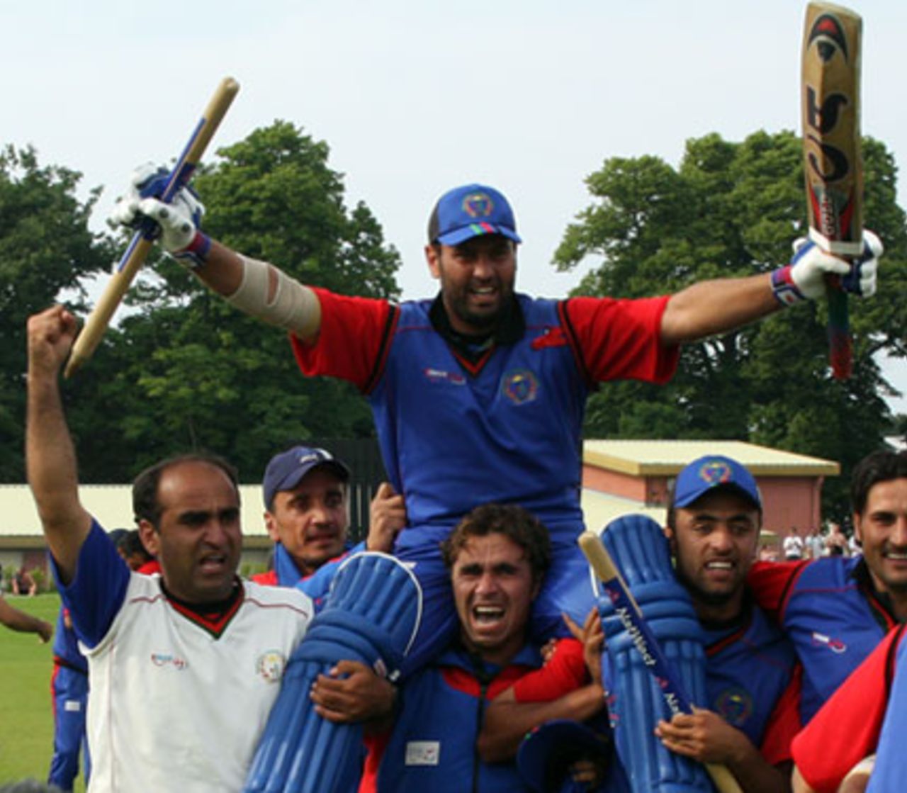 Afghanistan's Dawlat Ahmadzi is carried off after seeing his side home, Jersey v Afghanistan, World Cricket League Division 5, Jersey, May 31, 2008
