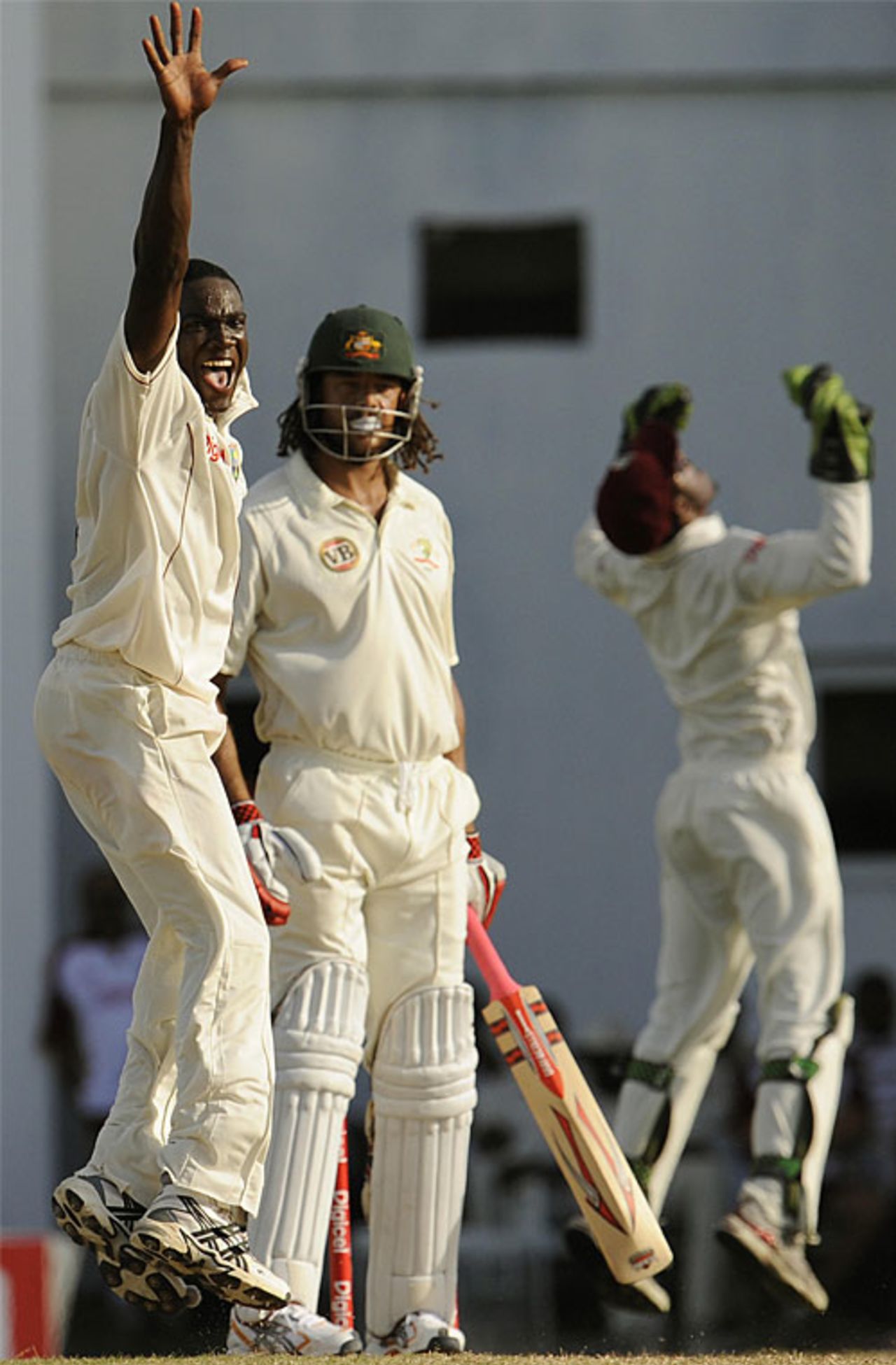 Jerome Taylor and Dinesh Ramdin are convinced they've removed Andrew Symonds, West Indies v Australia, 2nd Test, Antigua, June 2, 2008