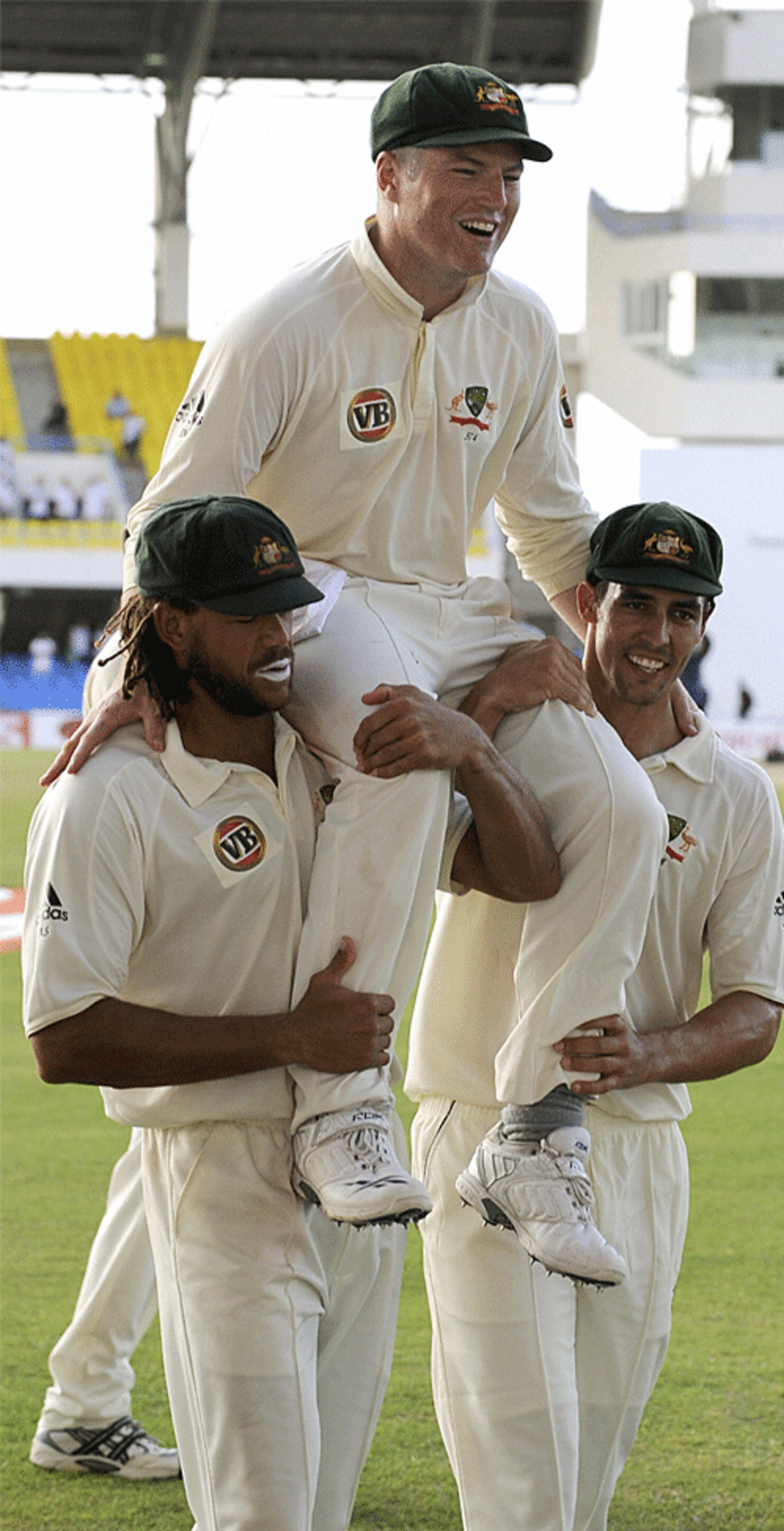Enjoy the ride: Andrew Symonds and Mitchell Johnson give Stuart MacGill a lift, West Indies v Australia, 2nd Test, Antigua, June 3, 2008
