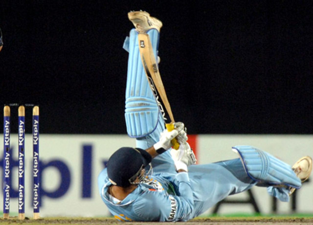 Irfan Pathan falls over after launching a six, India v Pakistan, Kitply Cup final, Mirpur, June 14, 2008