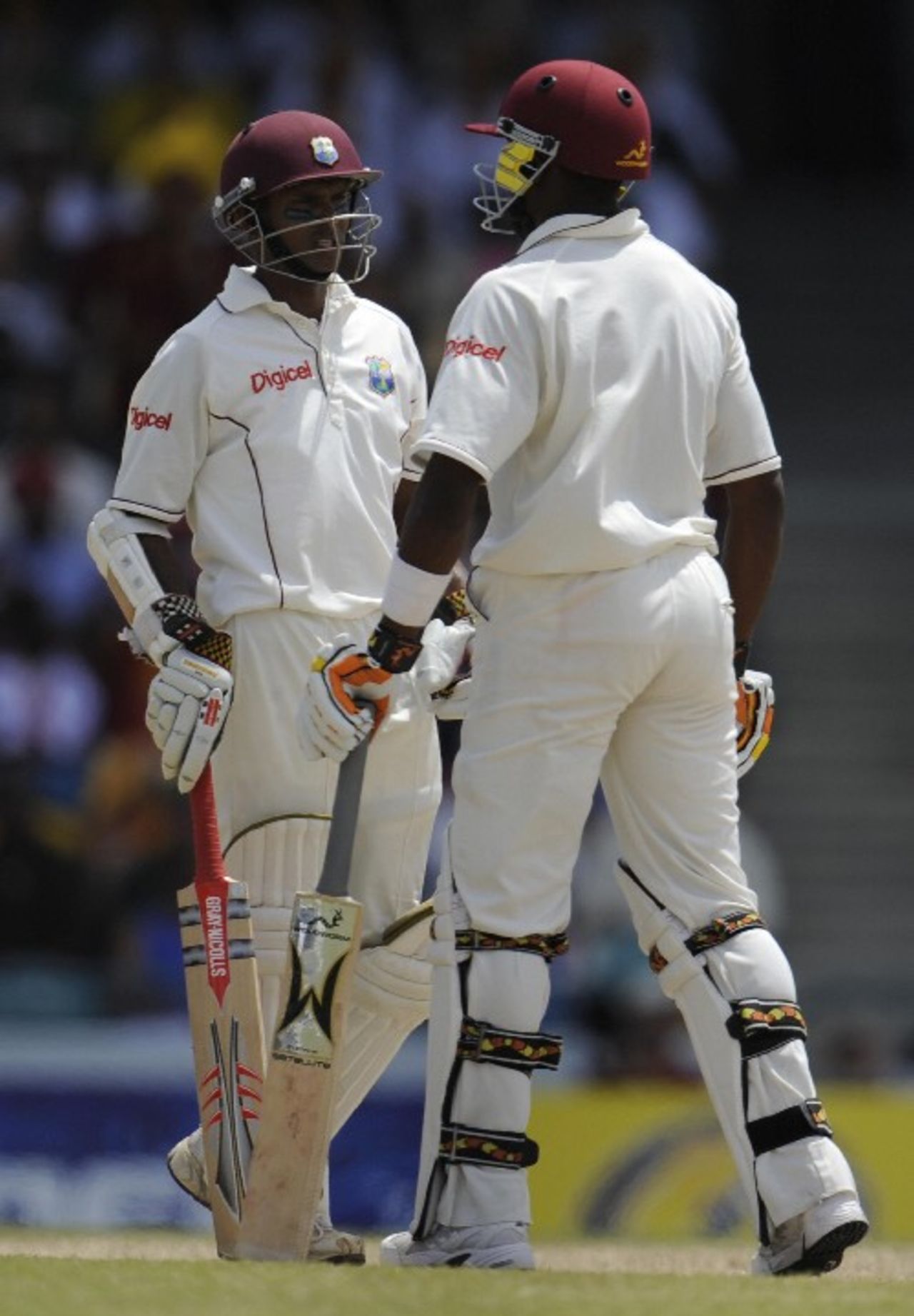 Shivnarine Chanderpaul and Dwayne Bravo chat during their 122-run stand, West Indies v Australia, 3rd Test, Barbados, 5th day, June 16, 2008