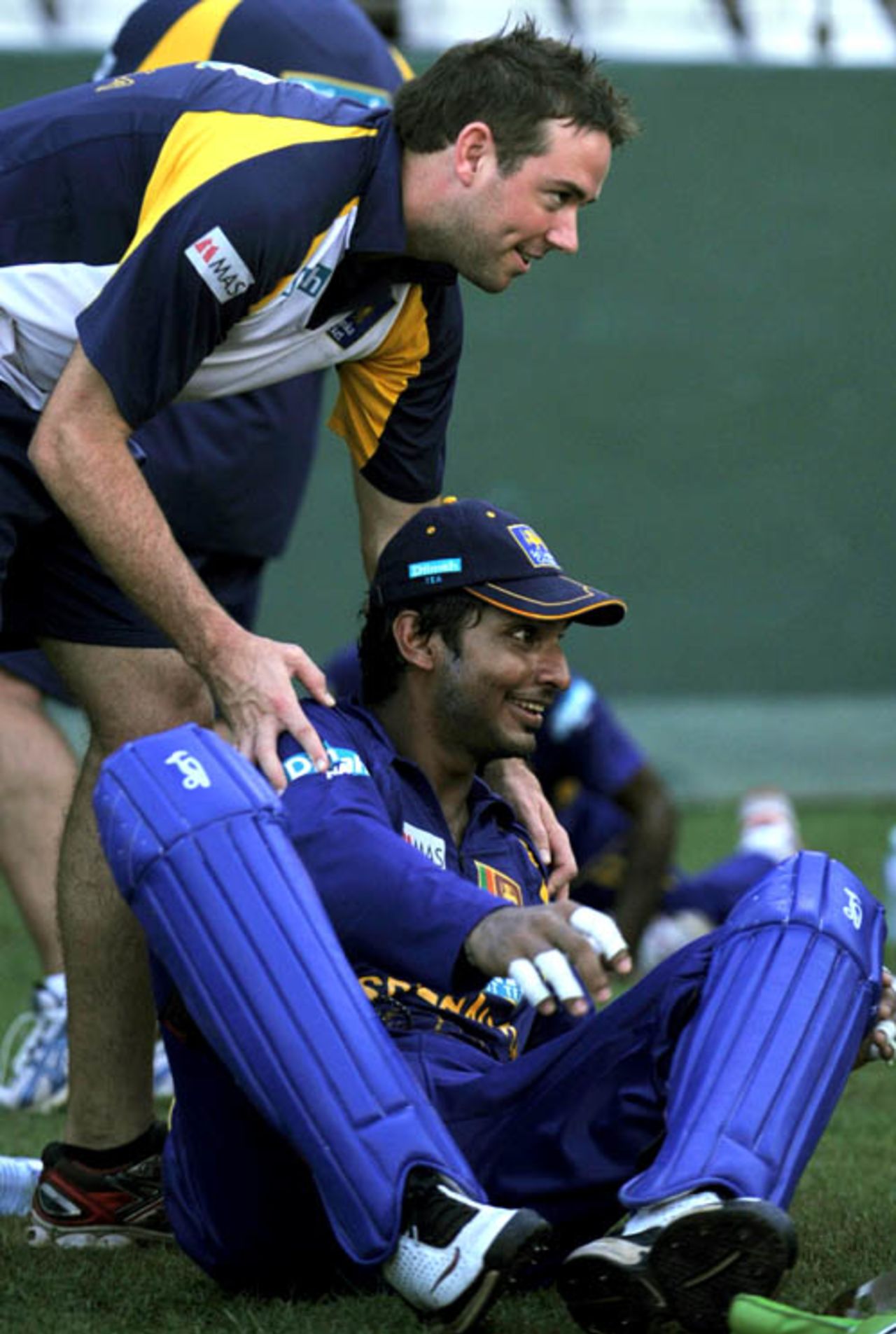 Sri Lanka trainer Jade Roberts shares a light moment with Kumar Sangakkara, Colombo, June 19, 2008