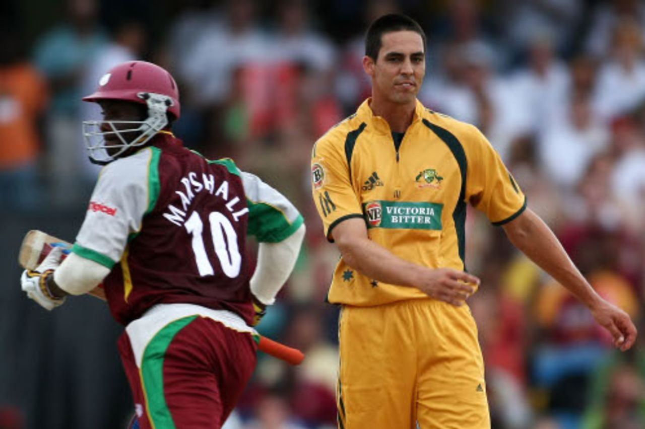 Mitchell Johnson looks on as Xavier Marshall picks up a single, West Indies v Australia, Twenty20, Barbados, June 20, 2008