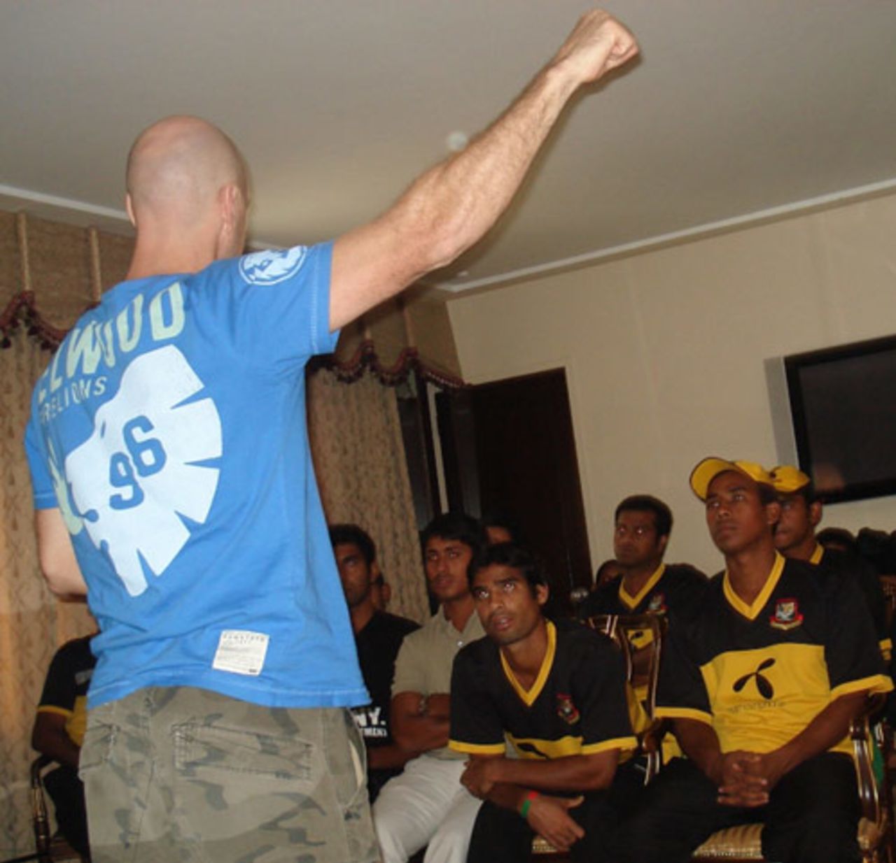 The Bangladesh players listen to coach Jamie Siddons at a team meeting, Lahore, June 23, 2008