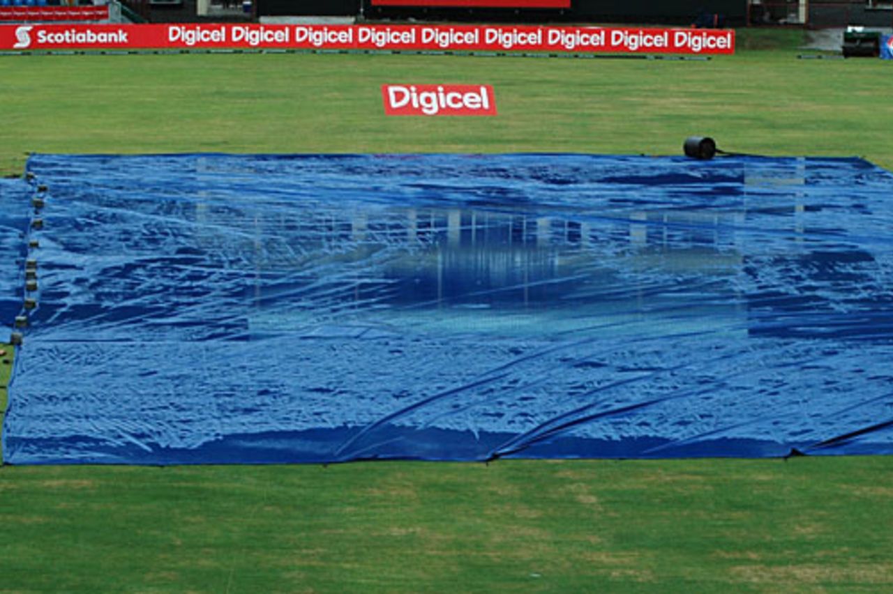 Heavy downpour left water on the covers ahead of the 1st ODI between West Indies and Australia, St Vincent, June 23, 2008