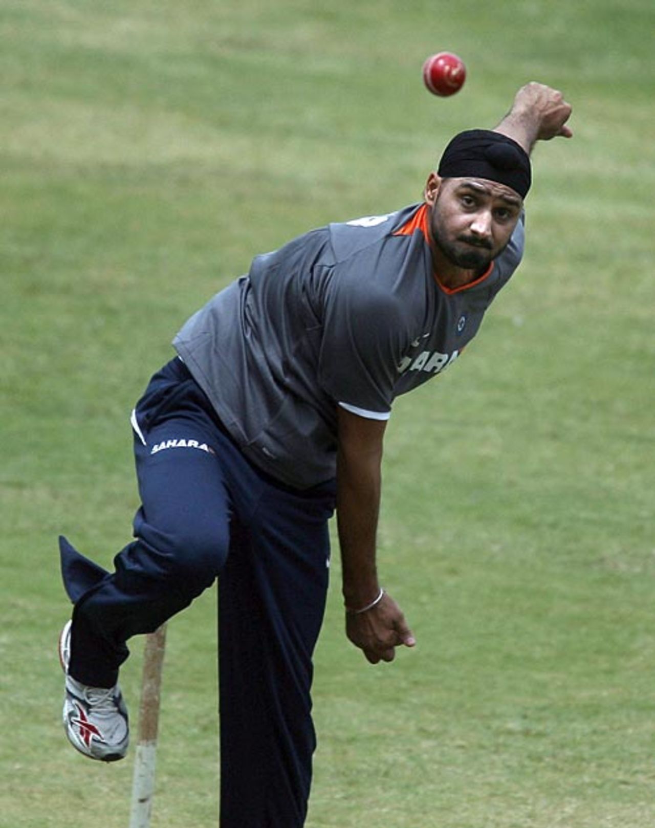 Harbhajan Singh bowls during a training camp at the Chinnaswamy Stadium, Bangalore, June 24, 2008