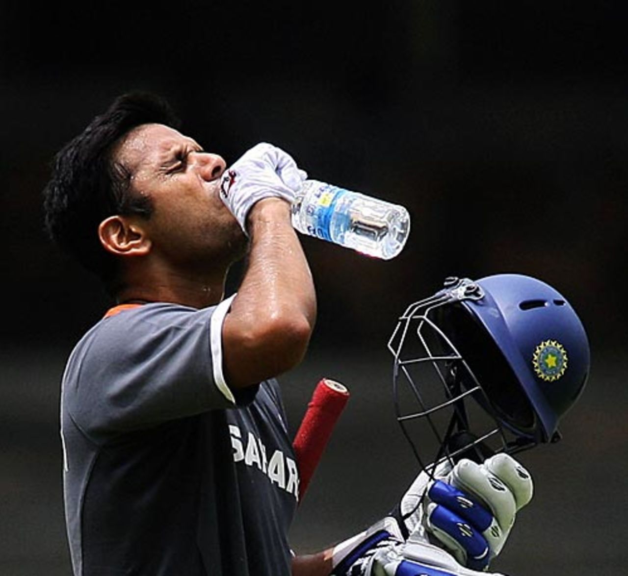 Rahul Dravid drinks some water during a training camp at the Chinnaswamy Stadium, Bangalore, June 24, 2008