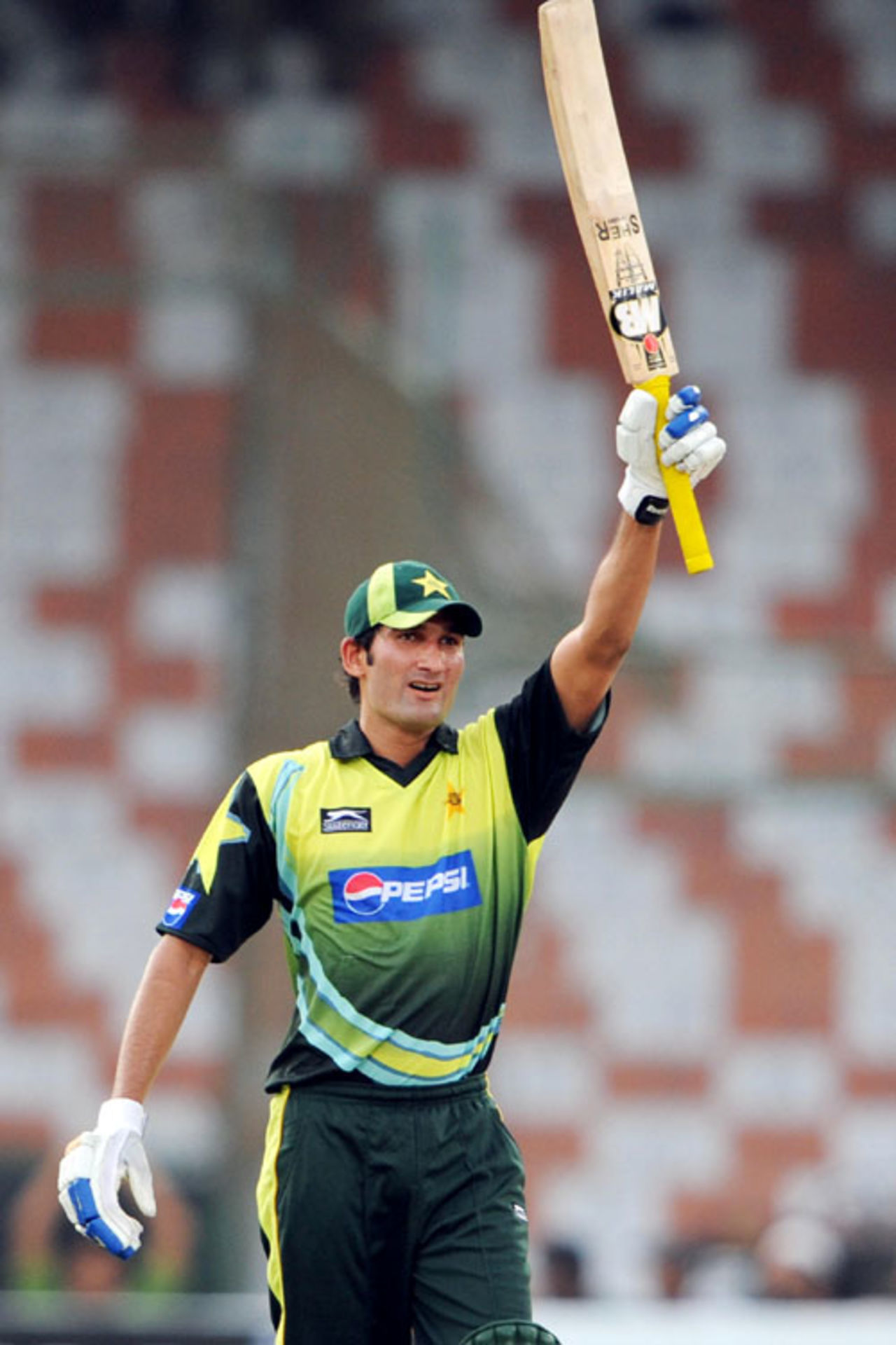 Sohail Tanvir raises his bat after reaching his fifty, Pakistan v Hong Kong, Group B, Asia Cup, Karachi, June 24, 2008