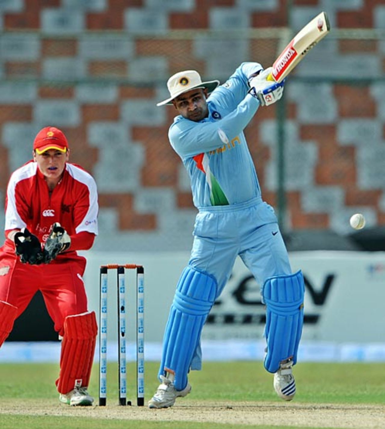 Virender Sehwag drives through the off side, Hong Kong v India, Group B, Asia Cup, Karachi, June 25, 2008