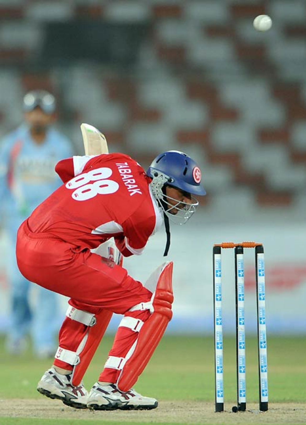 Tabarak Dar takes evasive action against a bouncer, Hong Kong v India, Group B, Asia Cup, Karachi, June 25, 2008