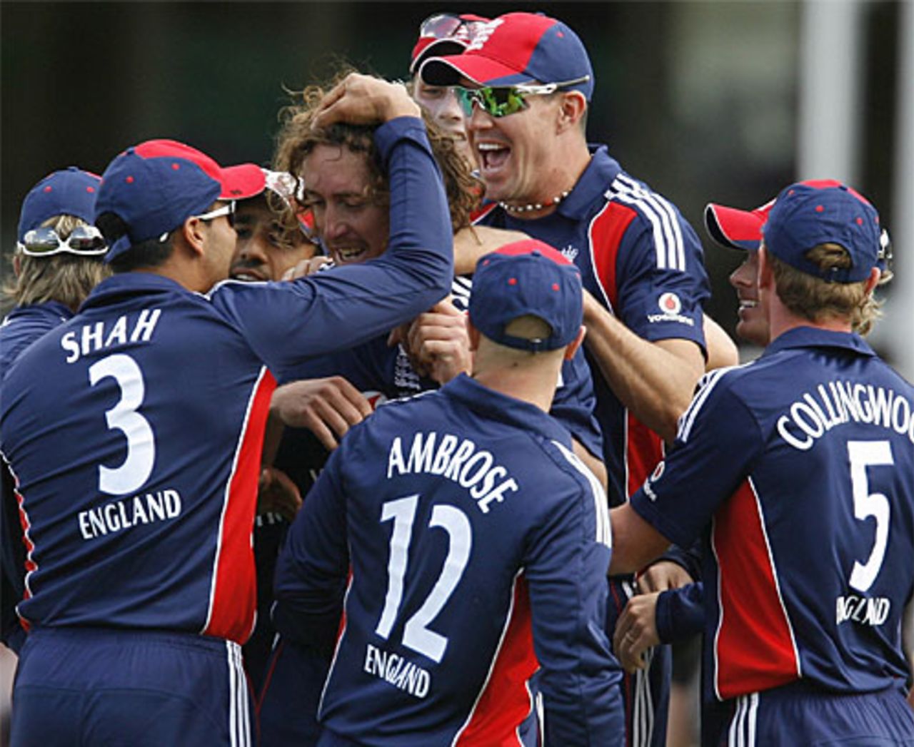 Mobbed: Ryan Sidebottom's surrounded by happy team-mates for crucial strikes, England v New Zealand, 4th ODI, The Oval, June 25, 2008