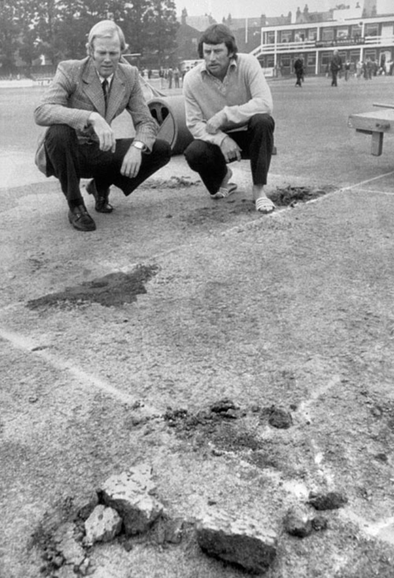 Tony Greig and Ian Chappell inspect the vandalised pitch, England v Australia, 3rd Test, Leeds, August 19, 1975